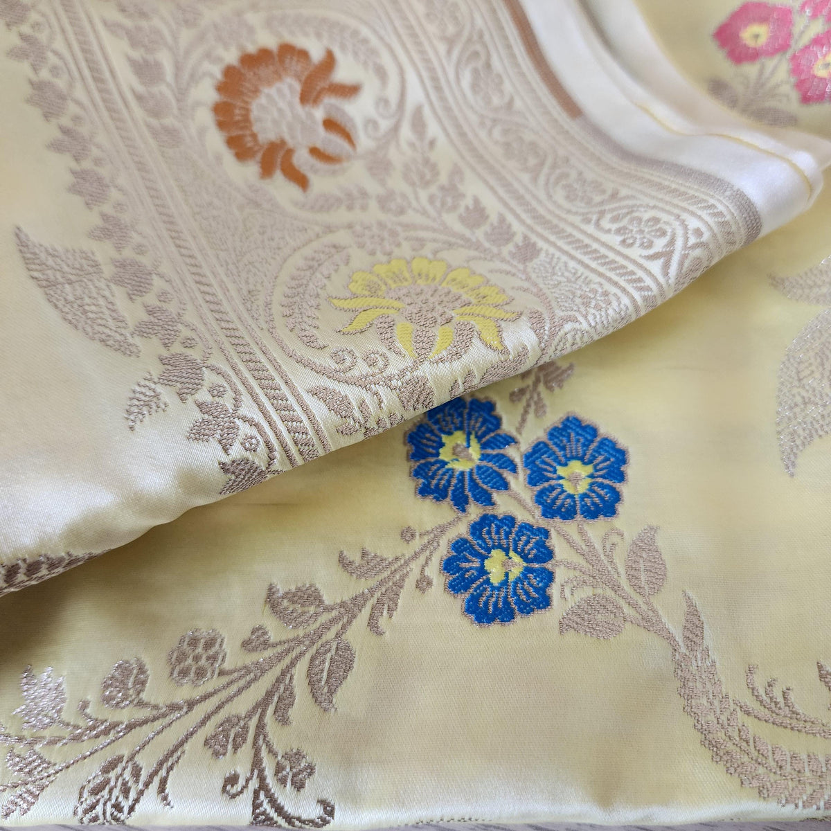 Enriched Butter Yellow Banarasi Katan Silk Saree with Multicolor Meenakari Floral Jaal