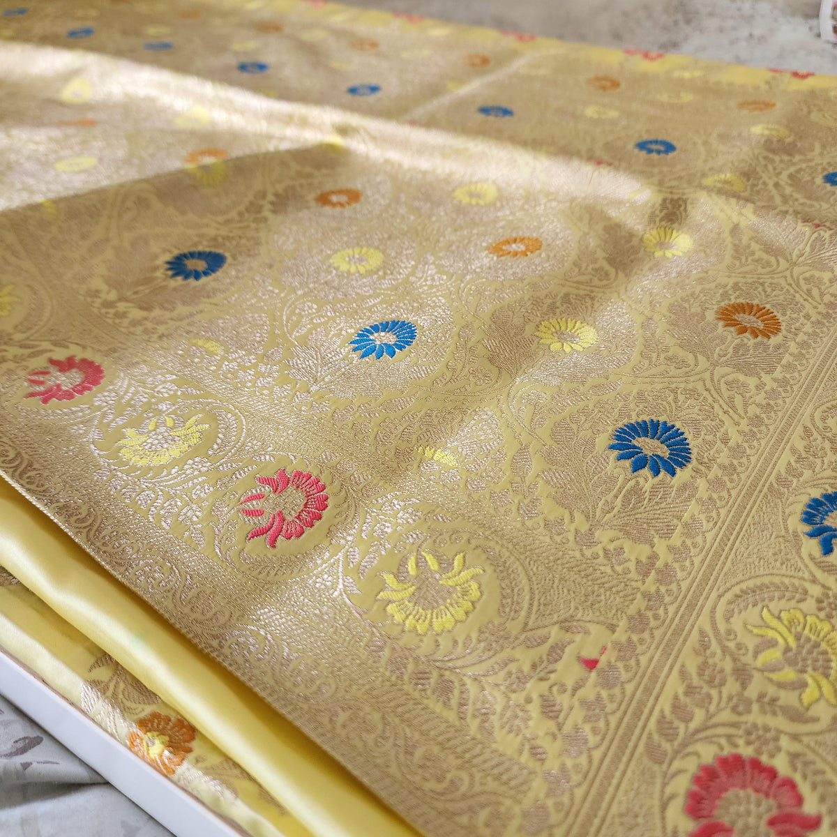 Enriched Butter Yellow Banarasi Katan Silk Saree with Multicolor Meenakari Floral Jaal