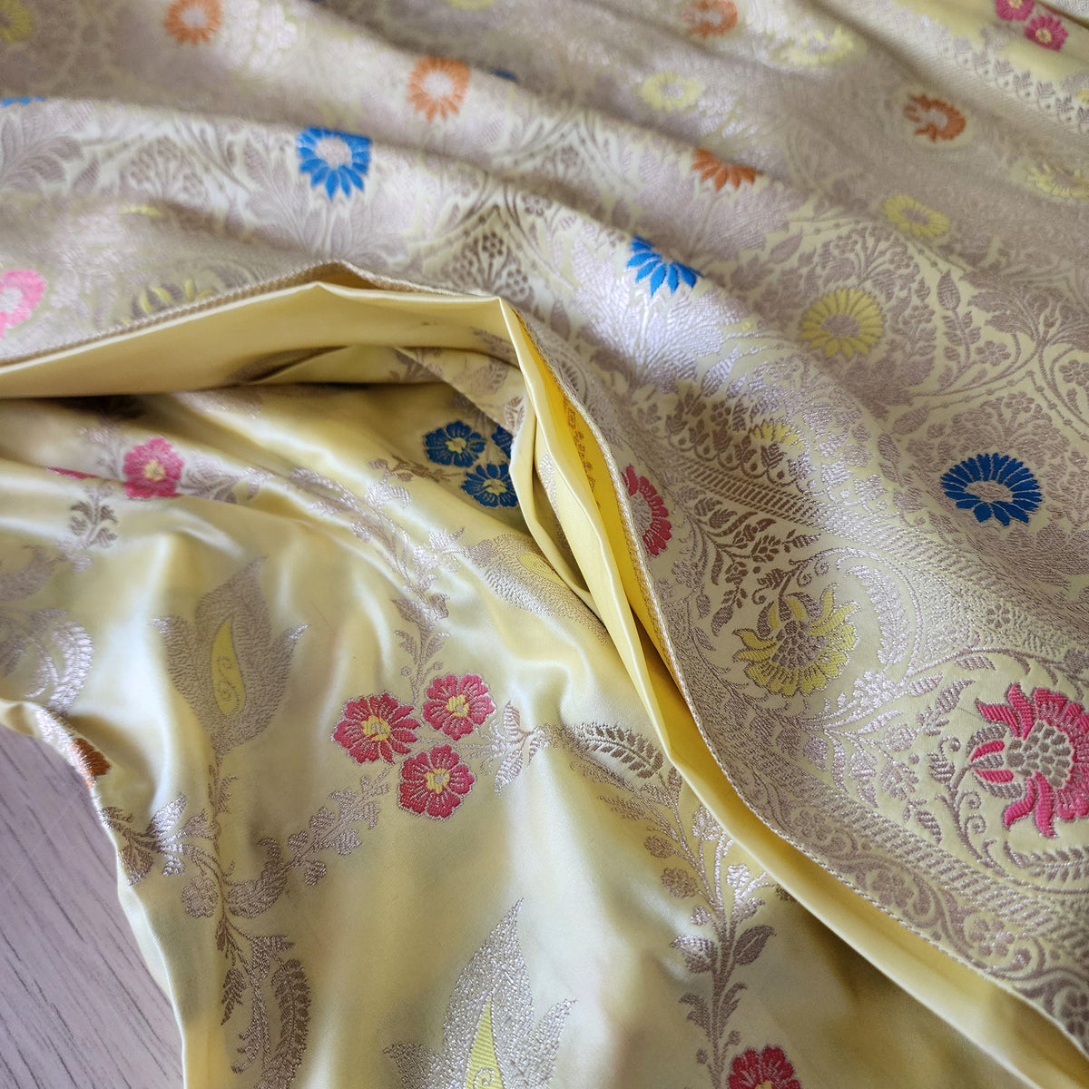 Enriched Butter Yellow Banarasi Katan Silk Saree with Multicolor Meenakari Floral Jaal