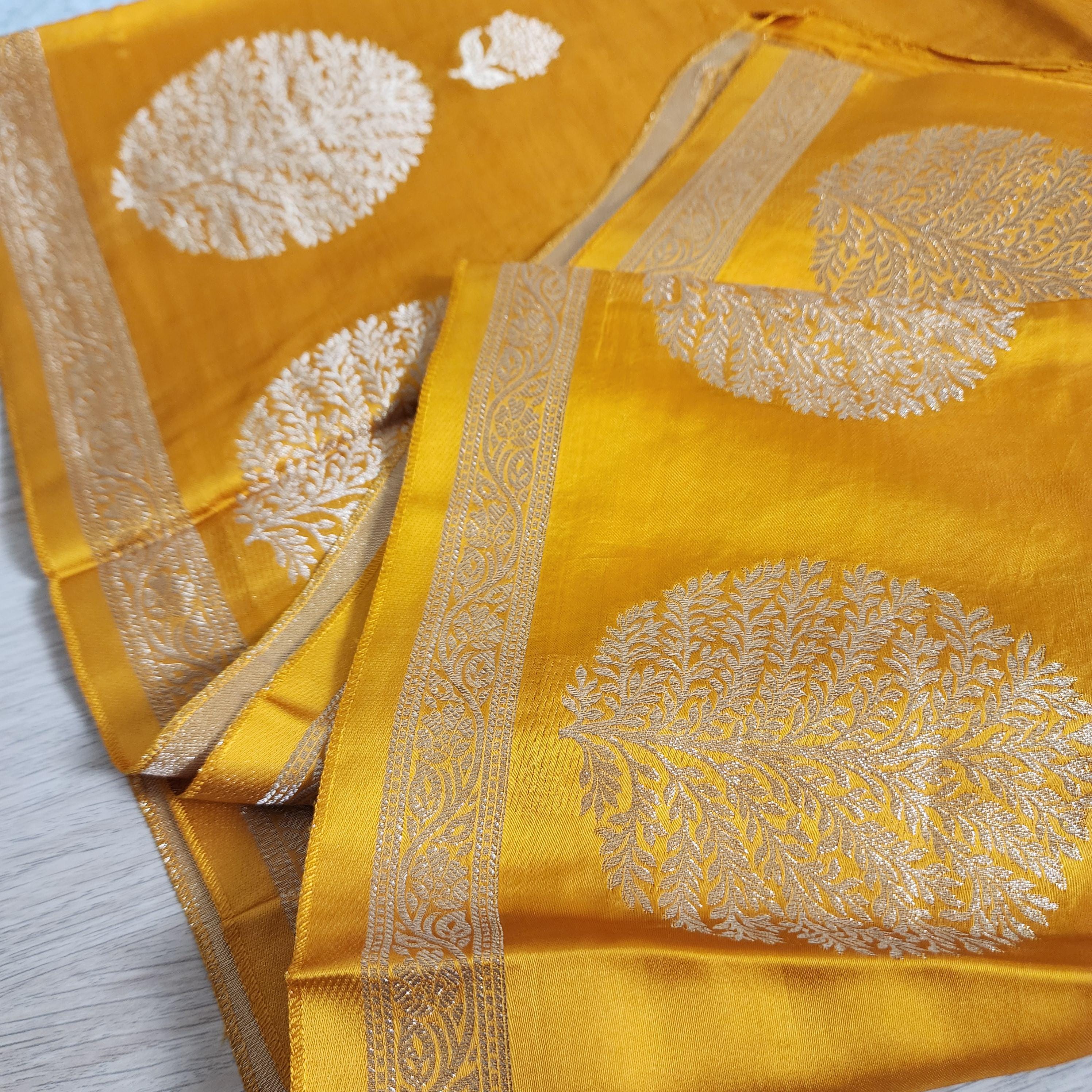 Banarasi Crape Georgette Saree in elegant yellow & light gold Zari