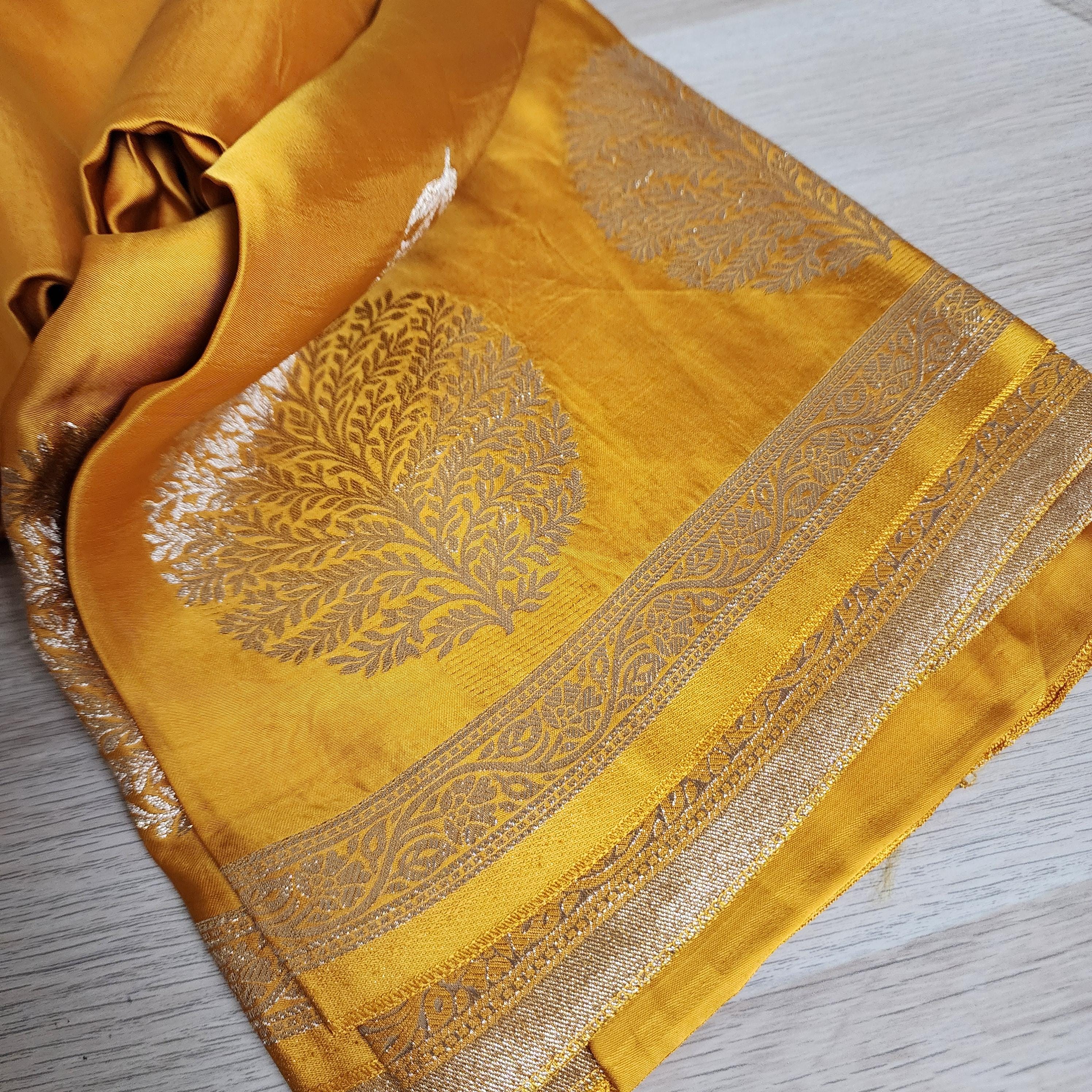 Banarasi Crape Georgette Saree in elegant yellow & light gold Zari