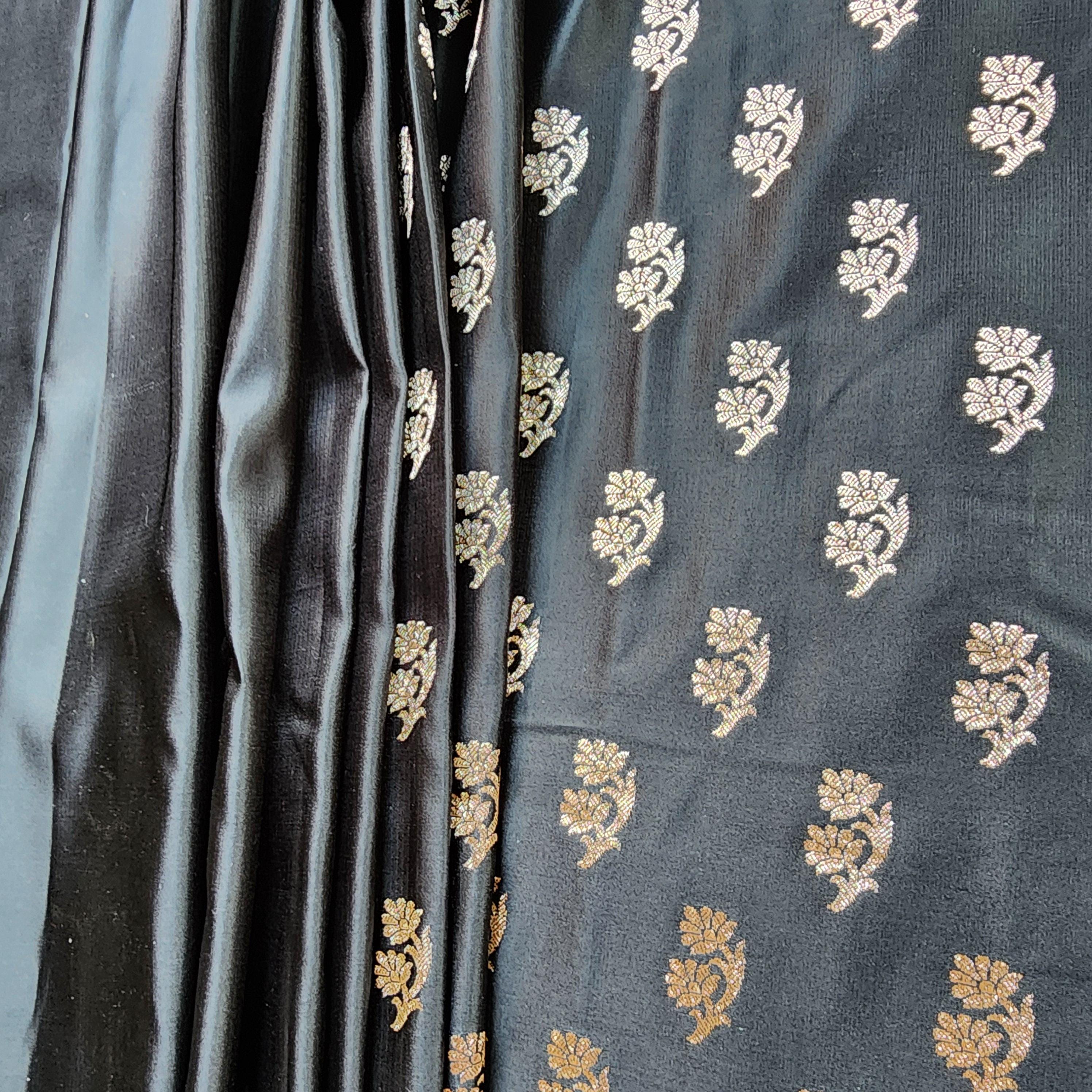 Mighty Black Pure Banarasi Katan Silk Saree with light Gold Zari Weaving