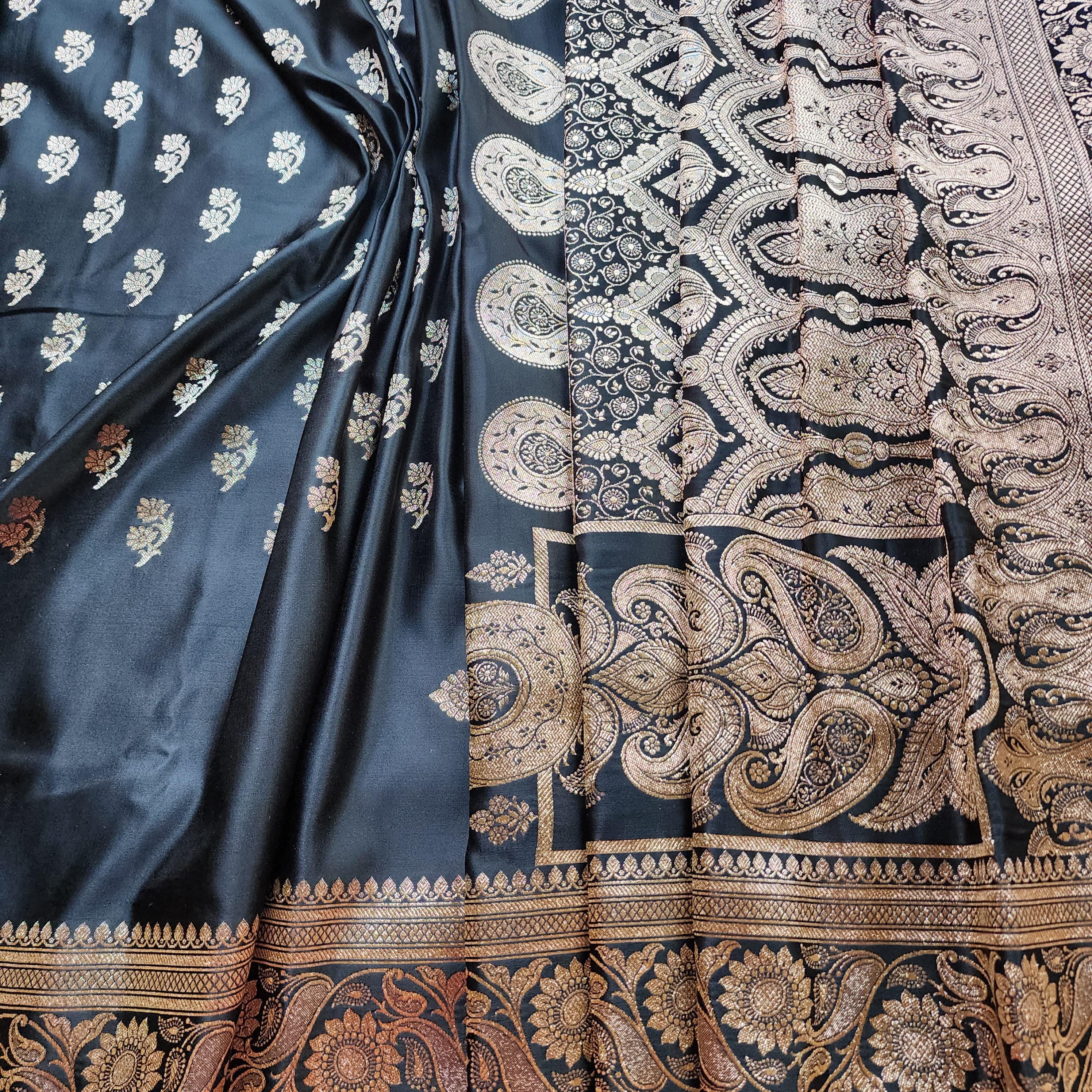 Mighty Black Pure Banarasi Katan Silk Saree with light Gold Zari Weaving