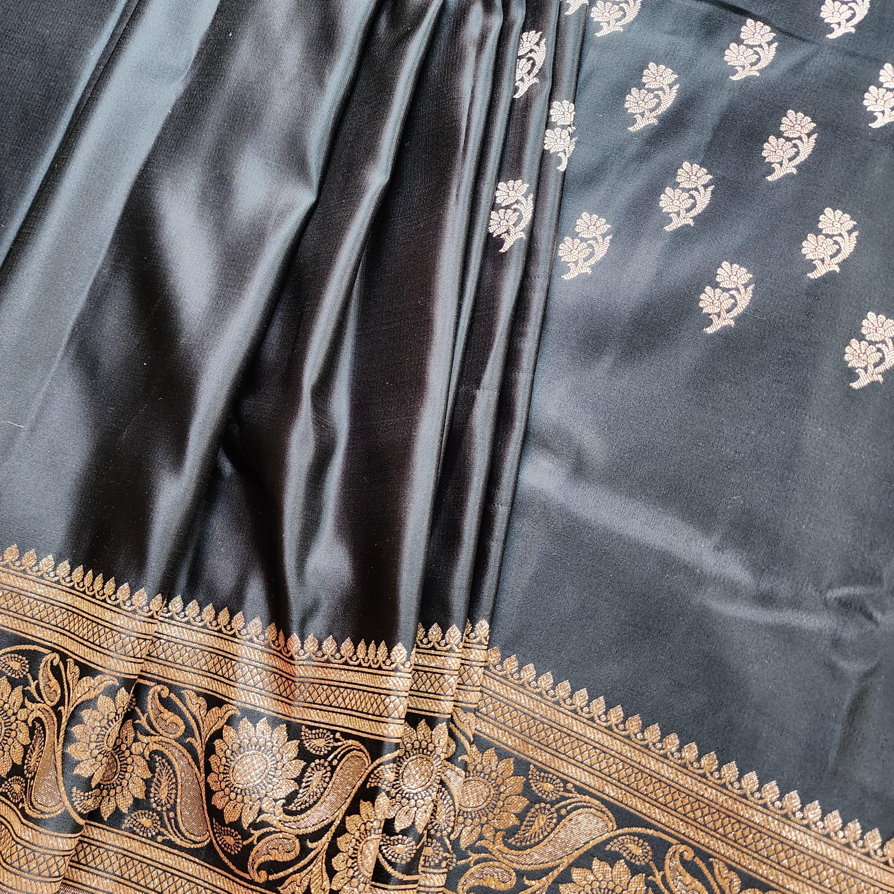 Mighty Black Pure Banarasi Katan Silk Saree with light Gold Zari Weaving