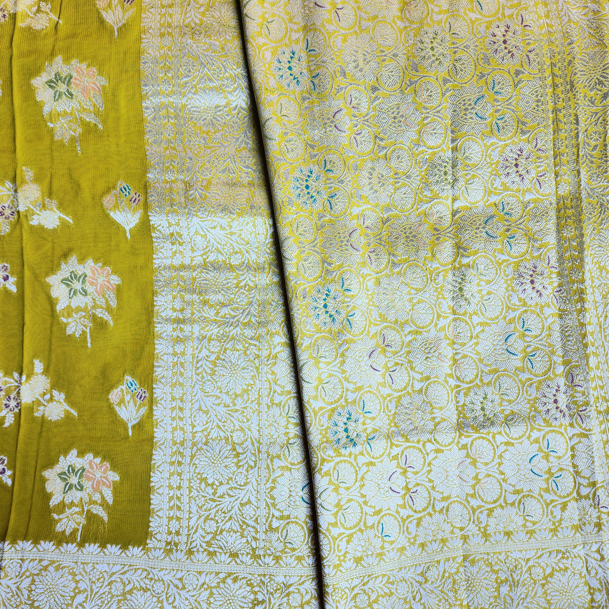 Yellowish Green Muslin Silk Saree with Floral Weave
