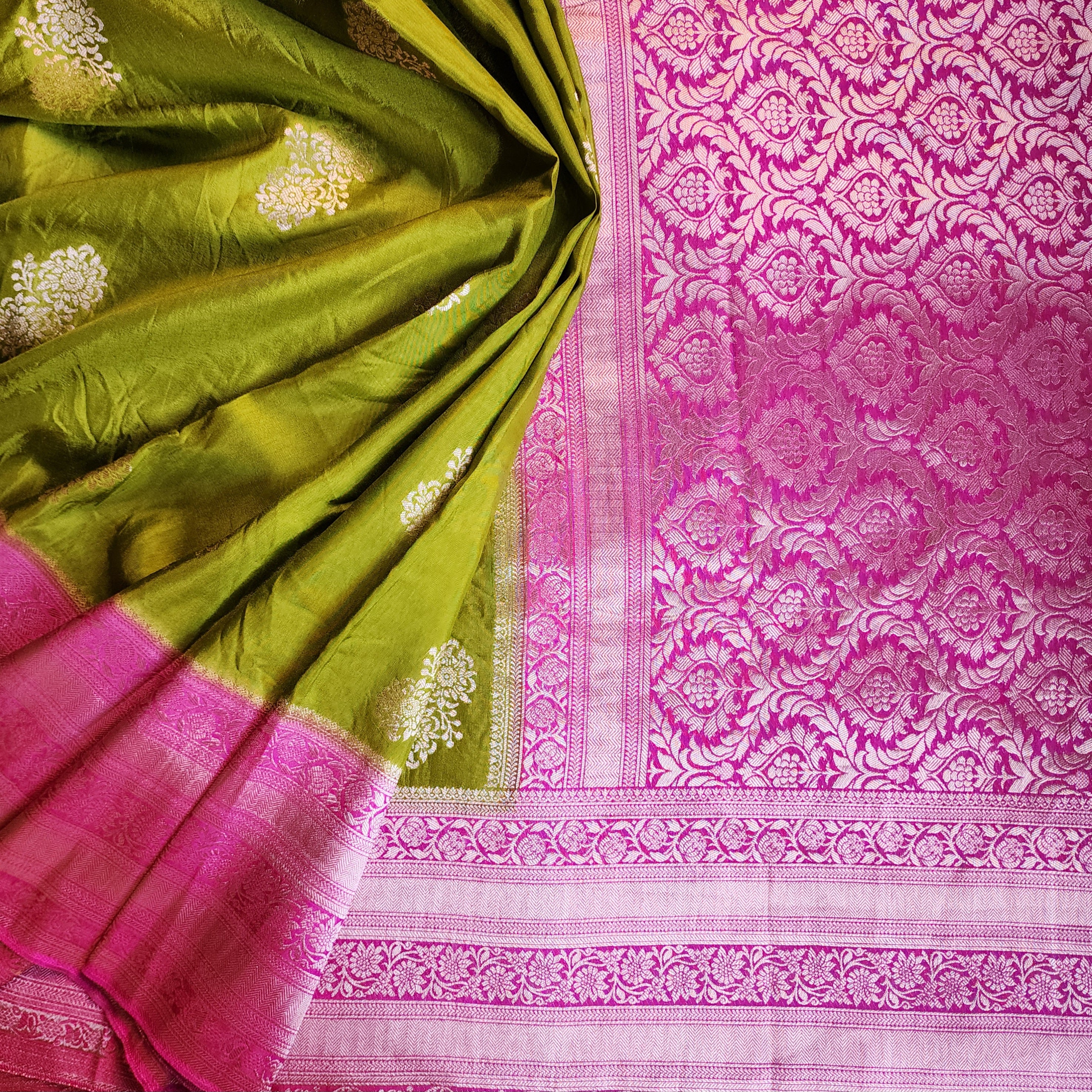 Olive Green Muslin Silk Saree with Traditional Silver Zari Work