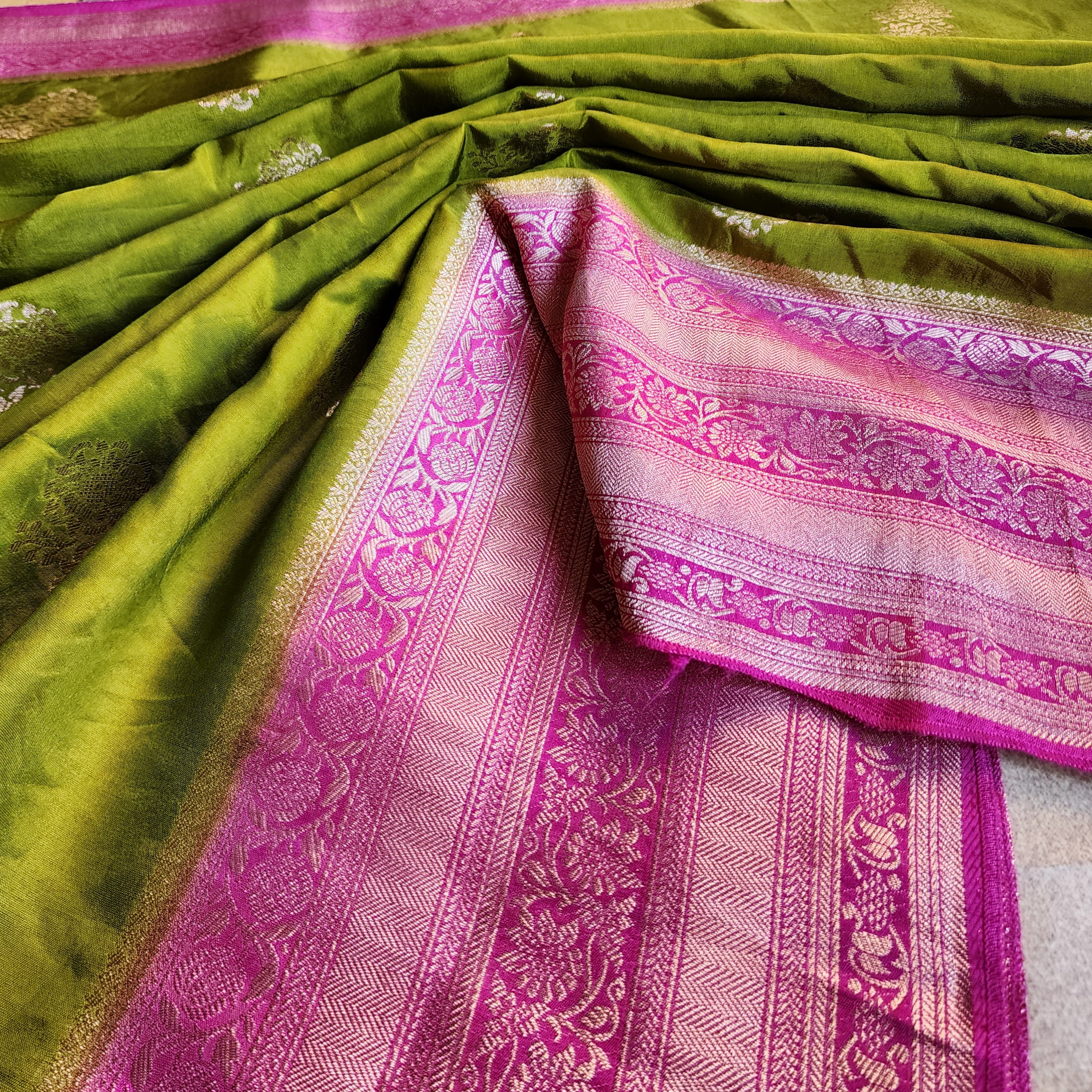 Olive Green Muslin Silk Saree with Traditional Silver Zari Work