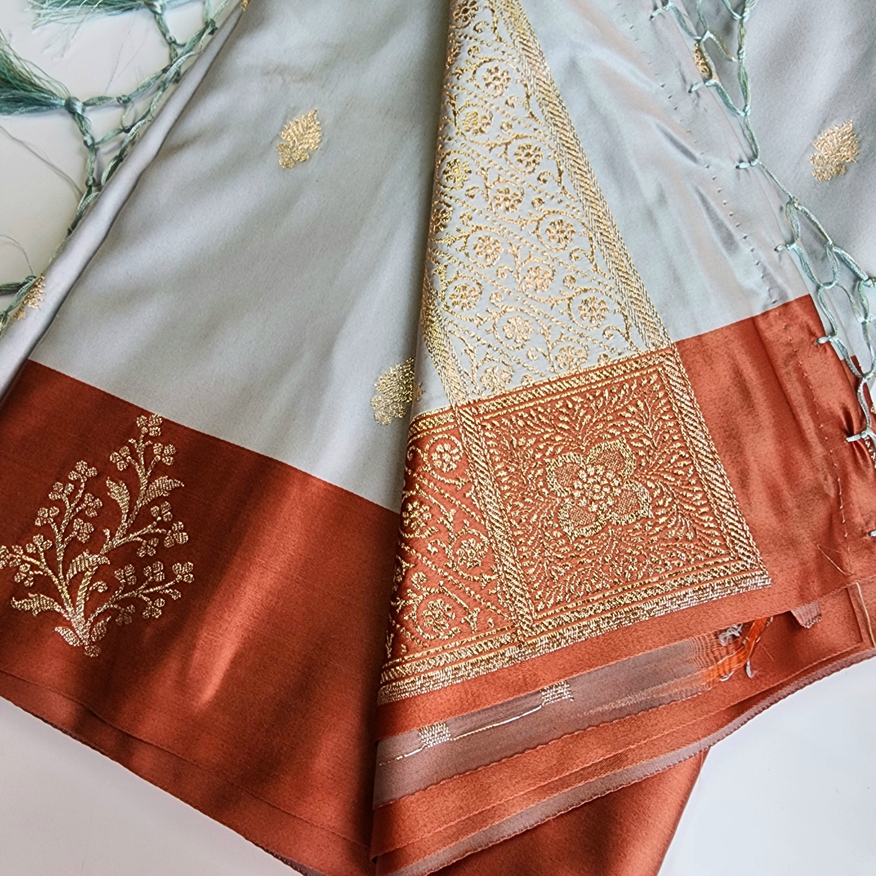 Ice Blue Katan Silk Saree with Peach Beige Gold Zari Border
