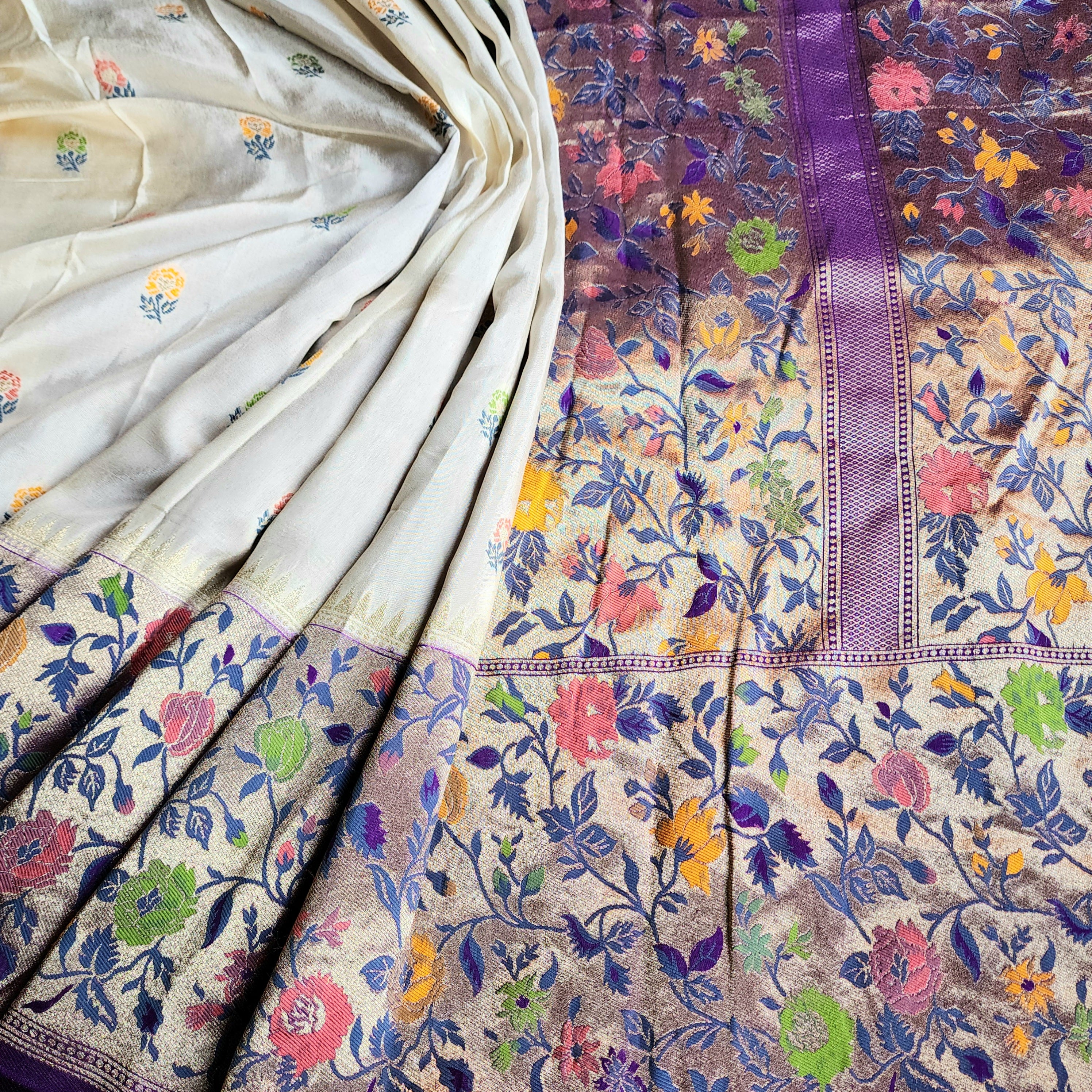 Soft Ivory Raw Silk Saree With Pastel Floral Weaving and Lilac Purple Border