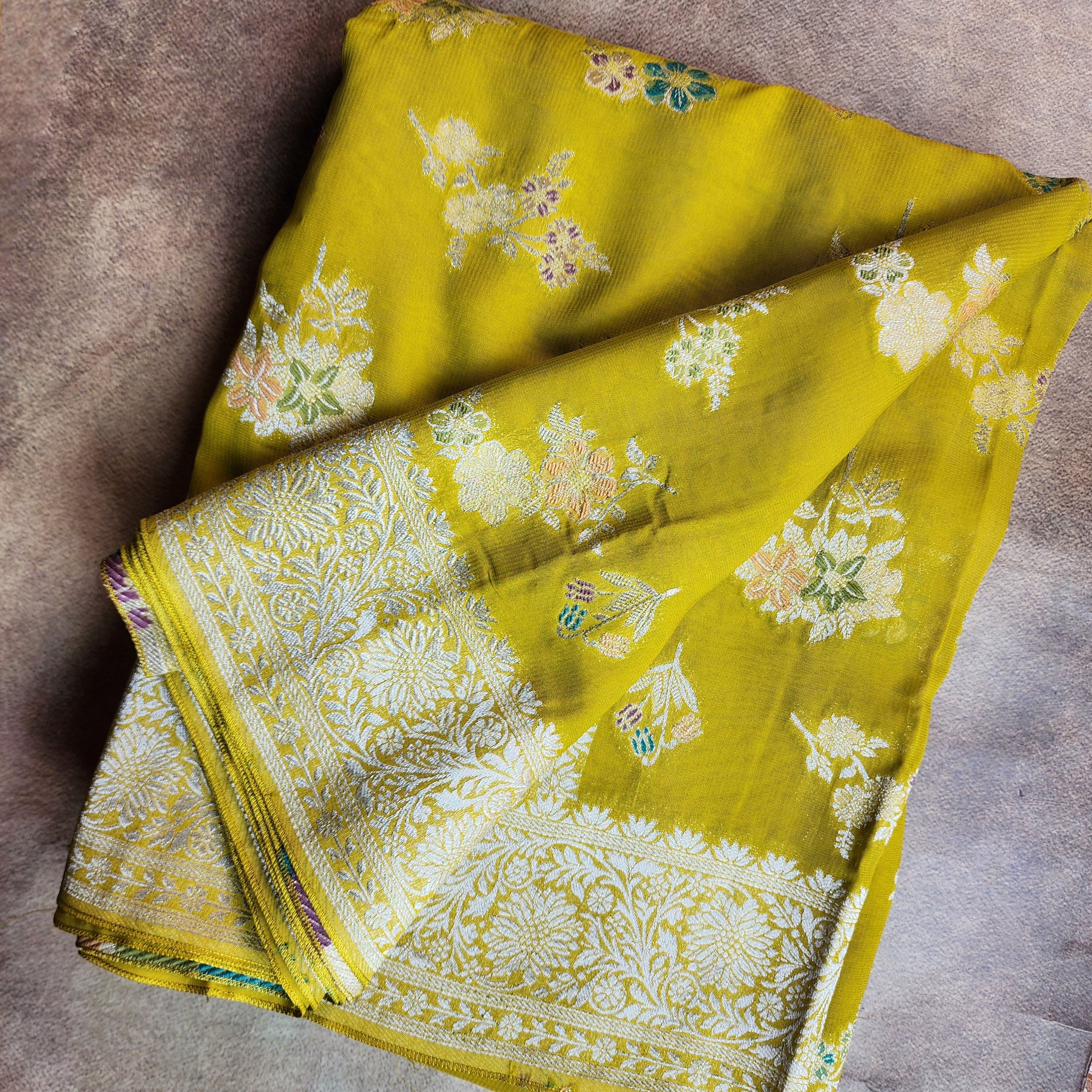 Yellowish Green Muslin Silk Saree with Floral Weave