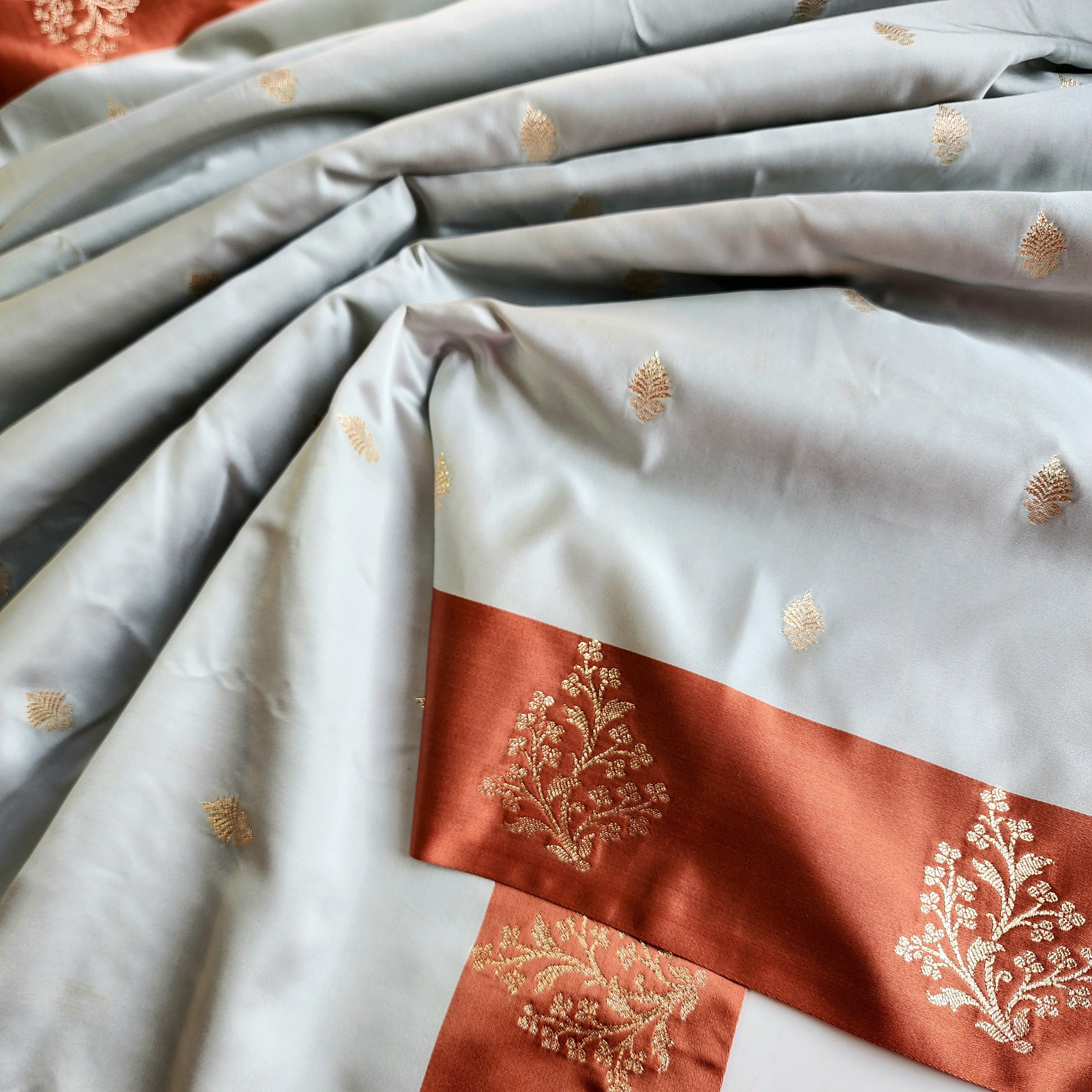 Ice Blue Katan Silk Saree with Peach Beige Gold Zari Border