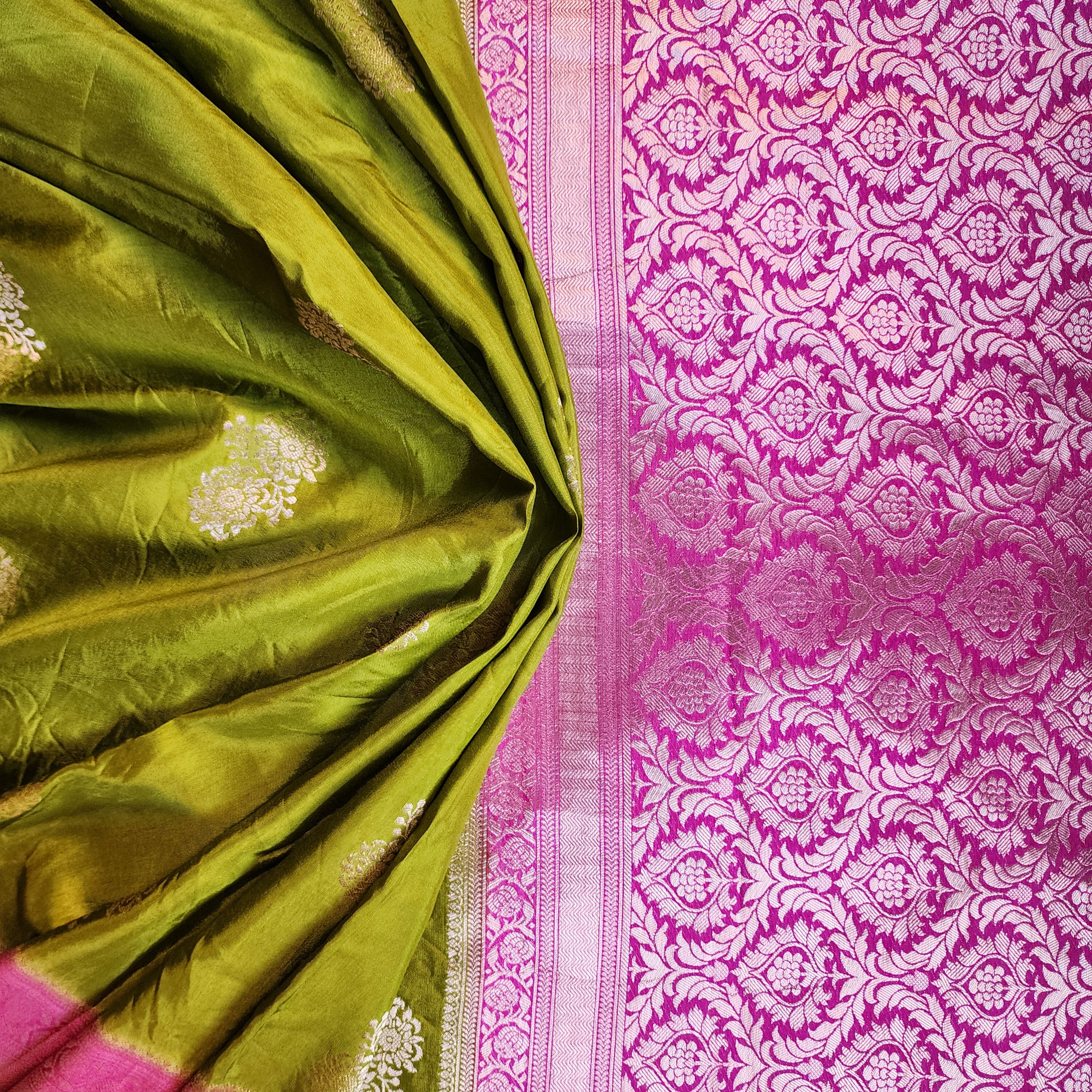 Olive Green Muslin Silk Saree with Traditional Silver Zari Work