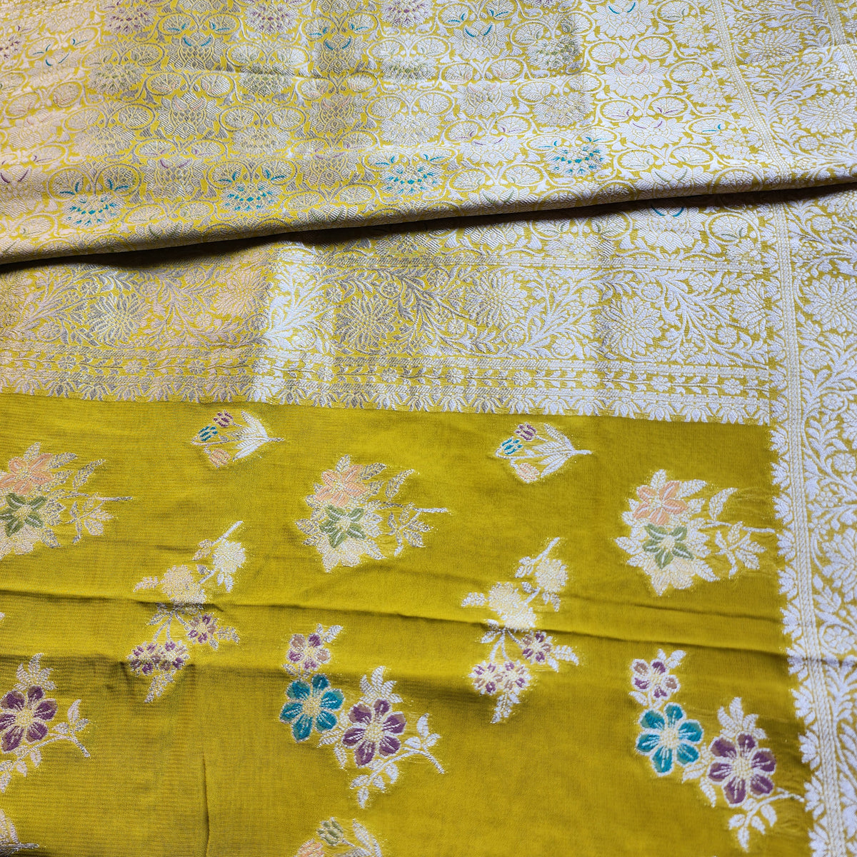 Yellowish Green Muslin Silk Saree with Floral Weave
