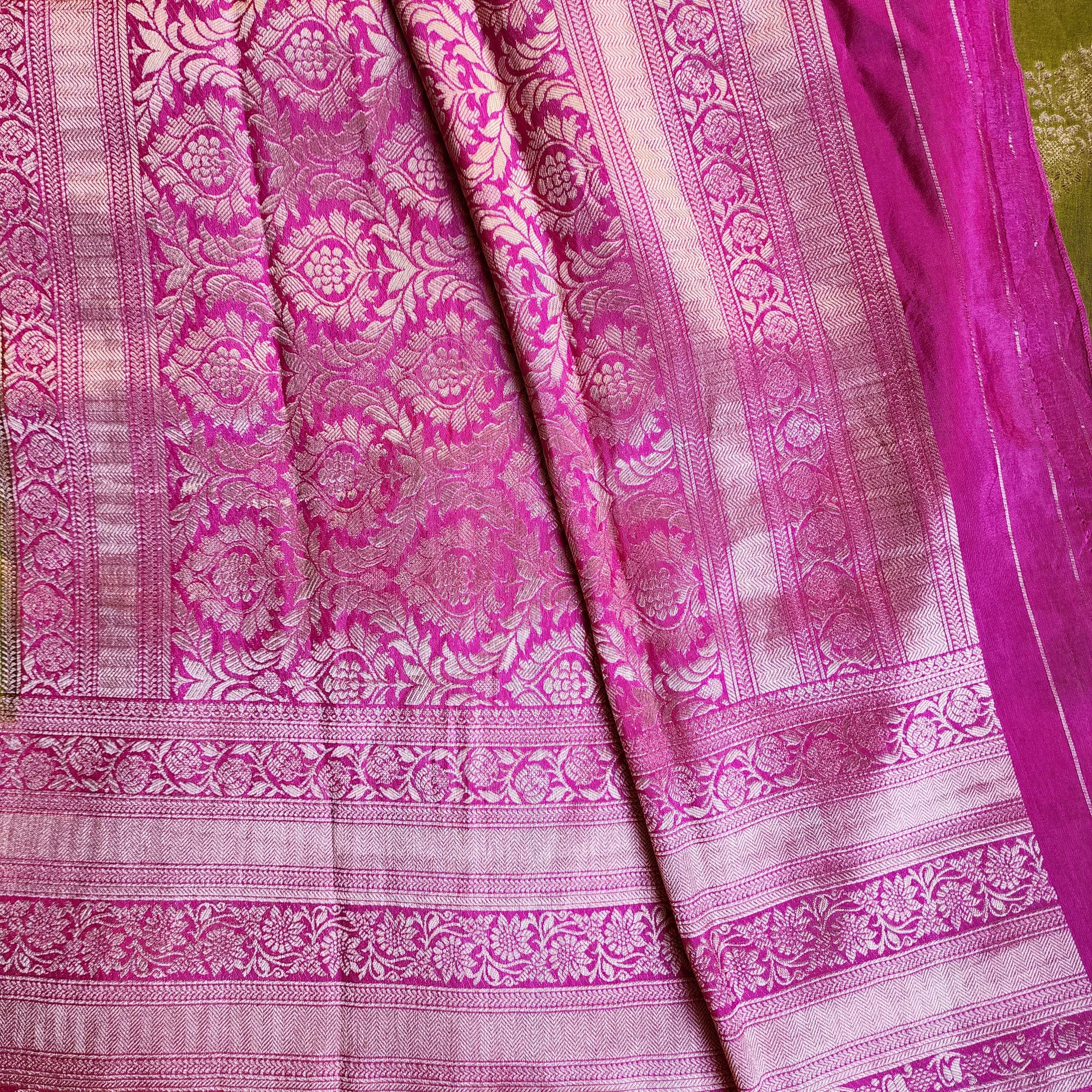 Olive Green Muslin Silk Saree with Traditional Silver Zari Work