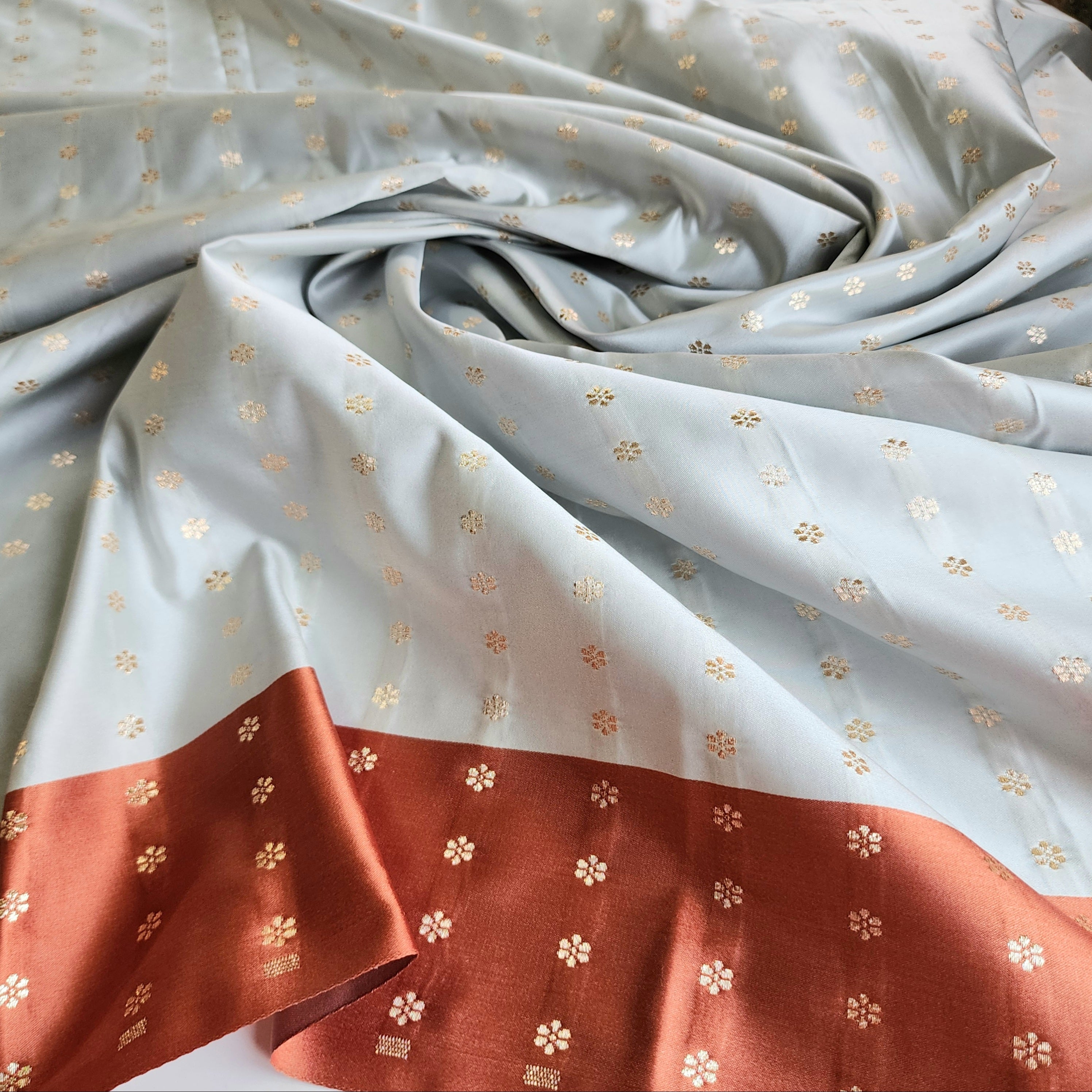 Ice Blue Katan Silk Saree with Peach Beige Gold Zari Border