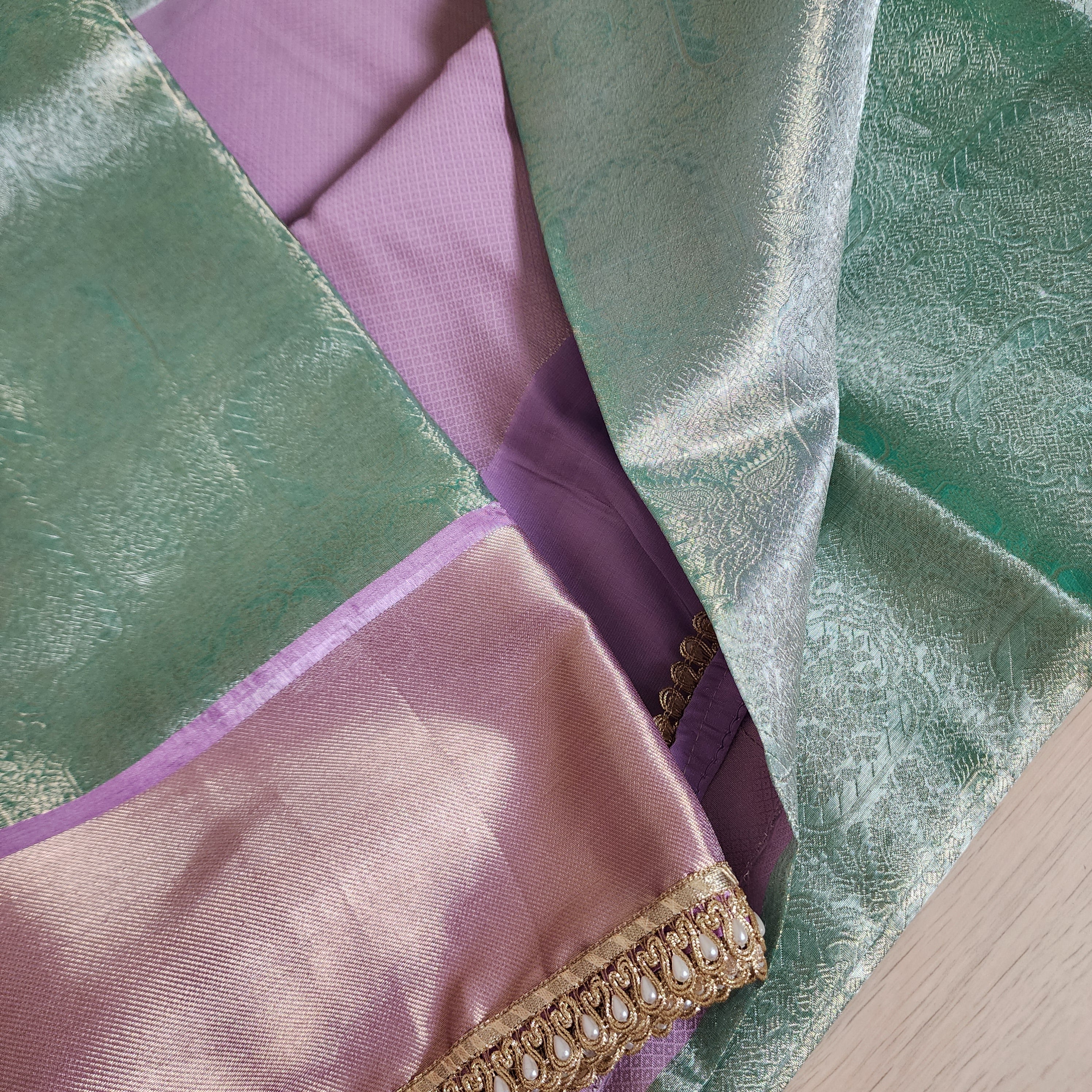 Pastel Sea Green and Pink Brocade Tissue Saree with beaded lace work