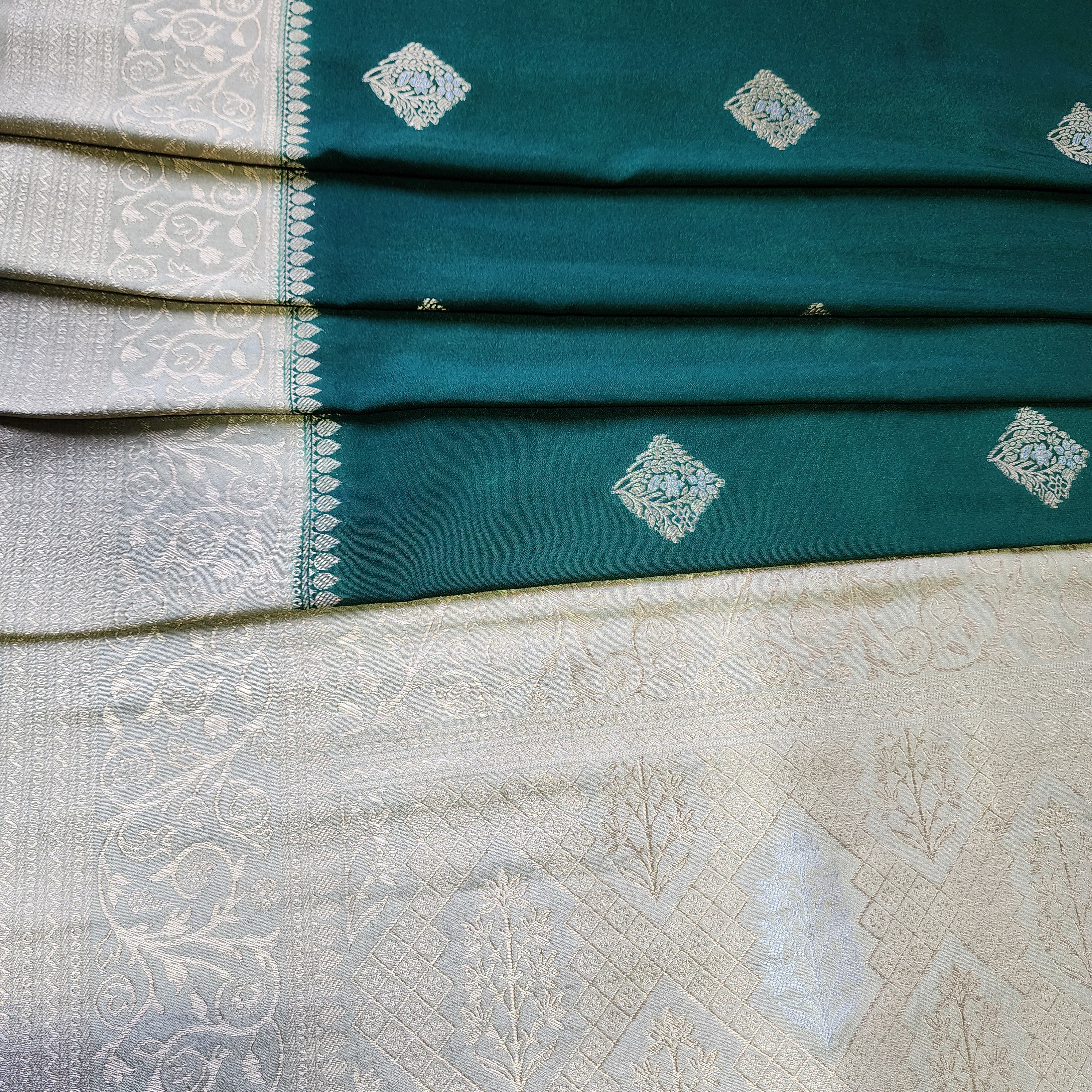 Bottle Green Crepe Georgette Silk Saree with Soft Champagne Gold Zari Border