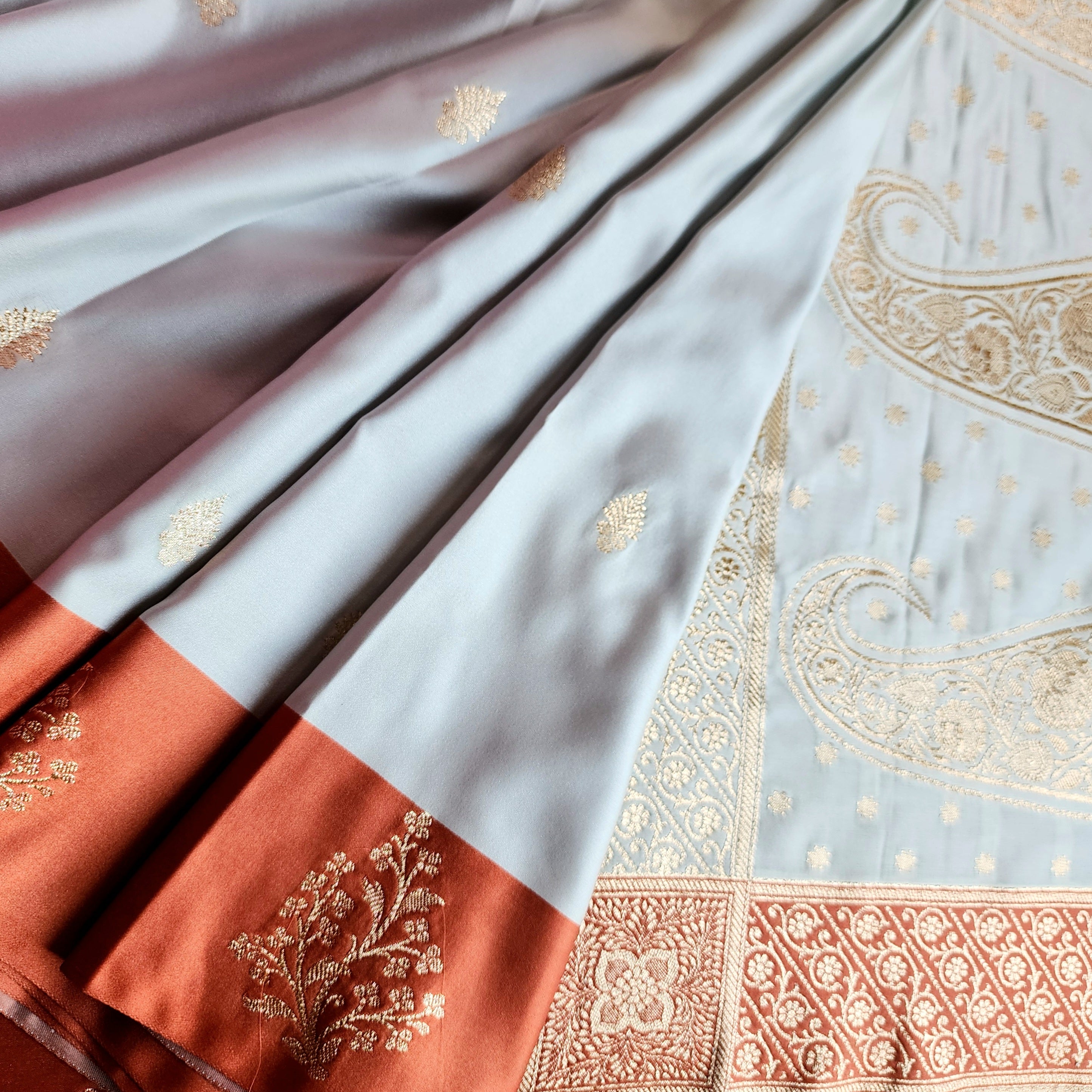 Ice Blue Katan Silk Saree with Peach Beige Gold Zari Border