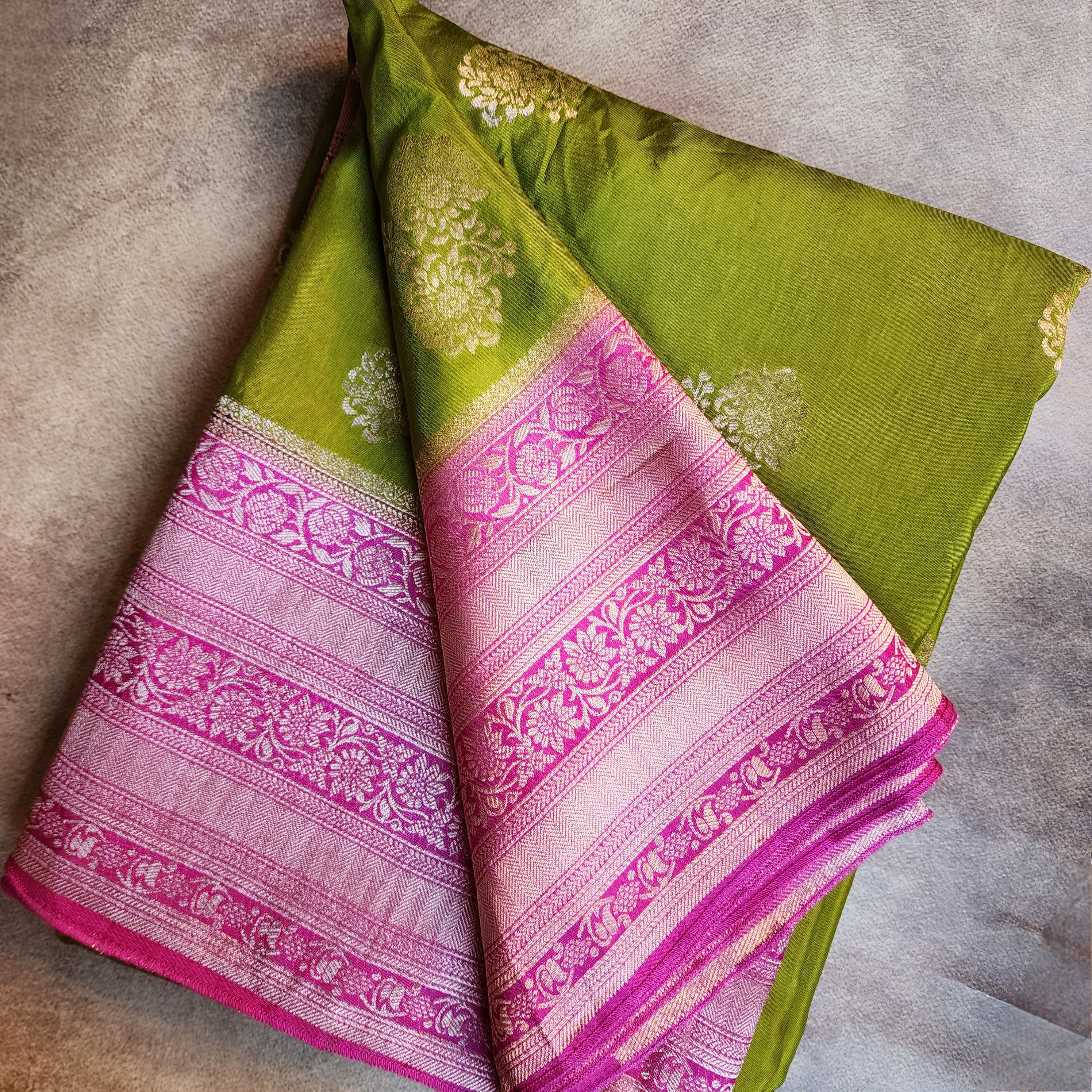 Olive Green Muslin Silk Saree with Traditional Silver Zari Work