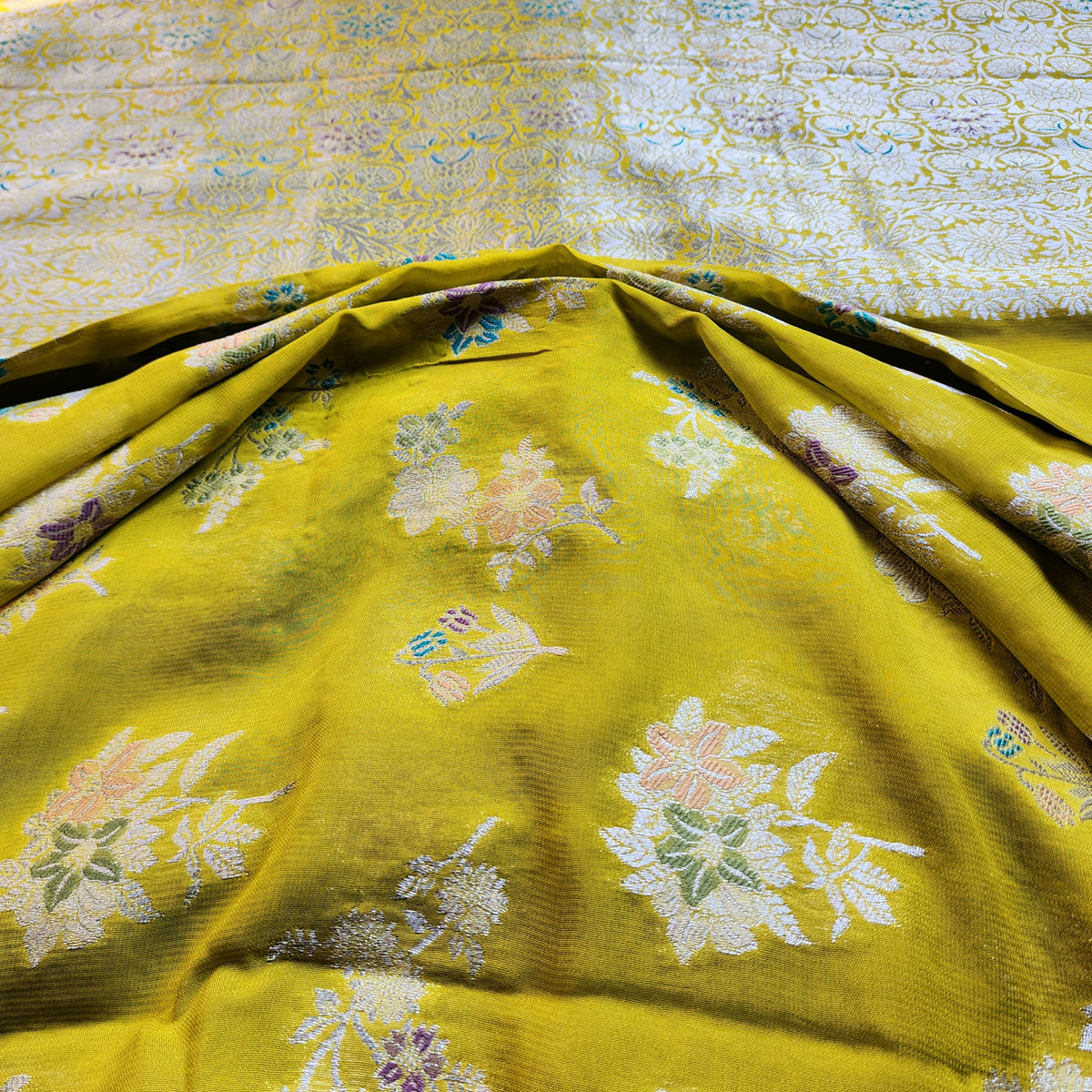 Yellowish Green Muslin Silk Saree with Floral Weave