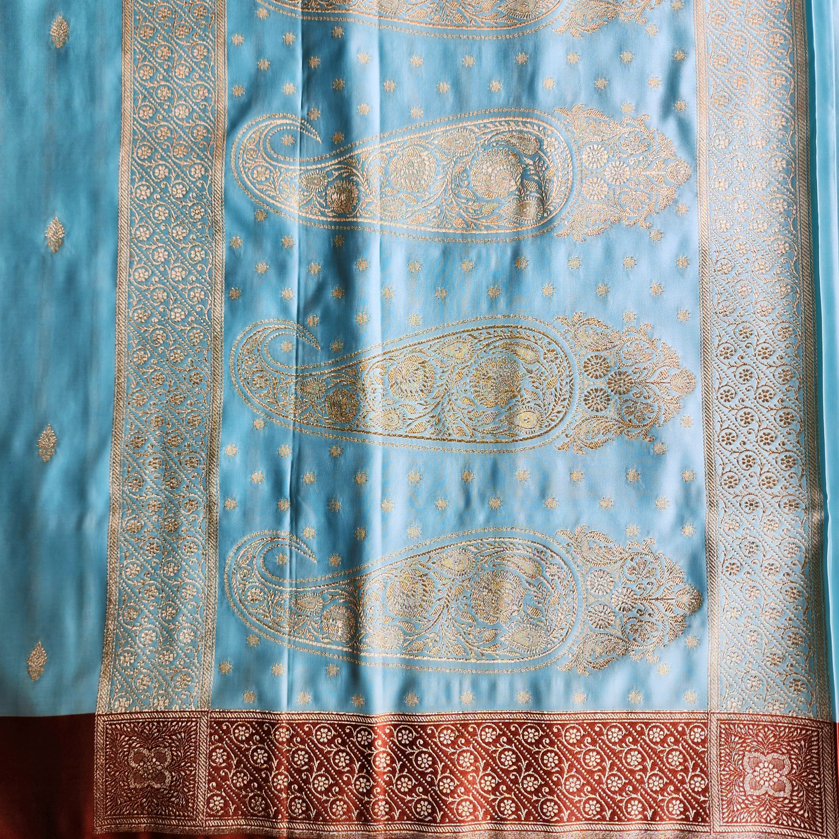 Powder Blue Katan Silk Saree with Rust Orange Gold Zari Border