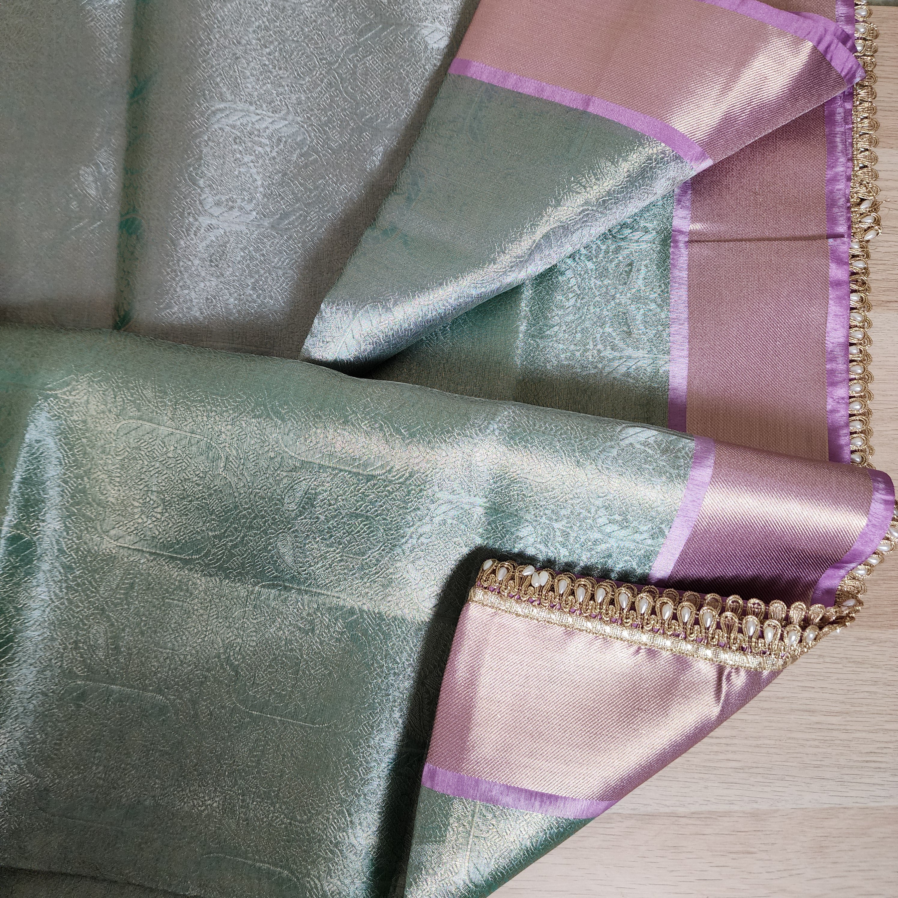 Pastel Sea Green and Pink Brocade Tissue Saree with beaded lace work