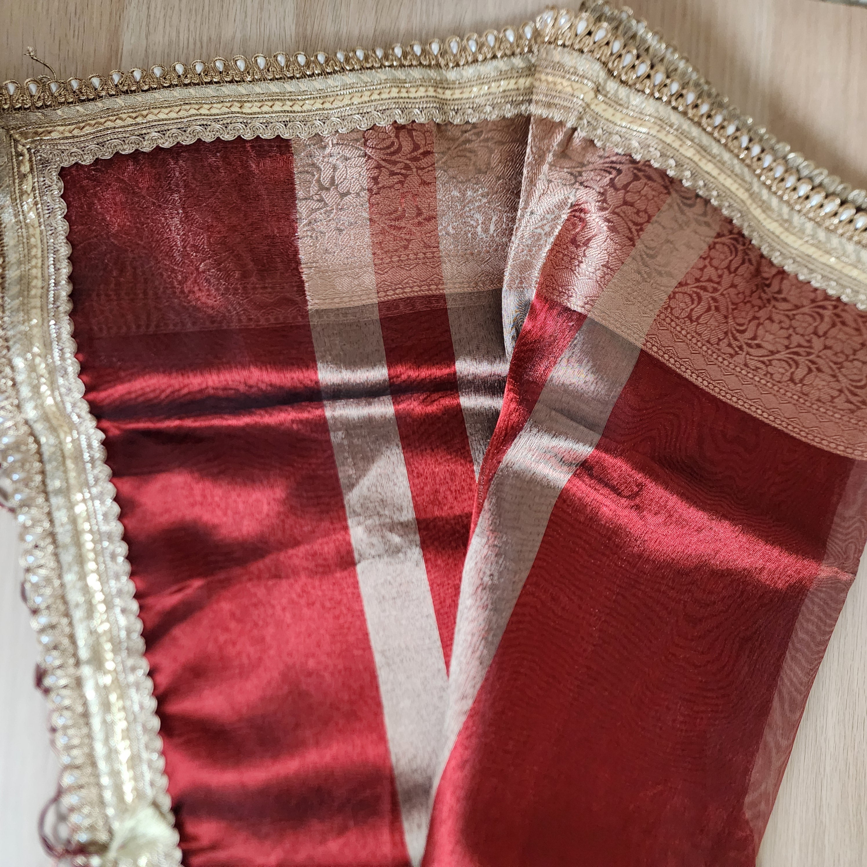 Carmine Red Tissue Silk Saree with beaded lace work