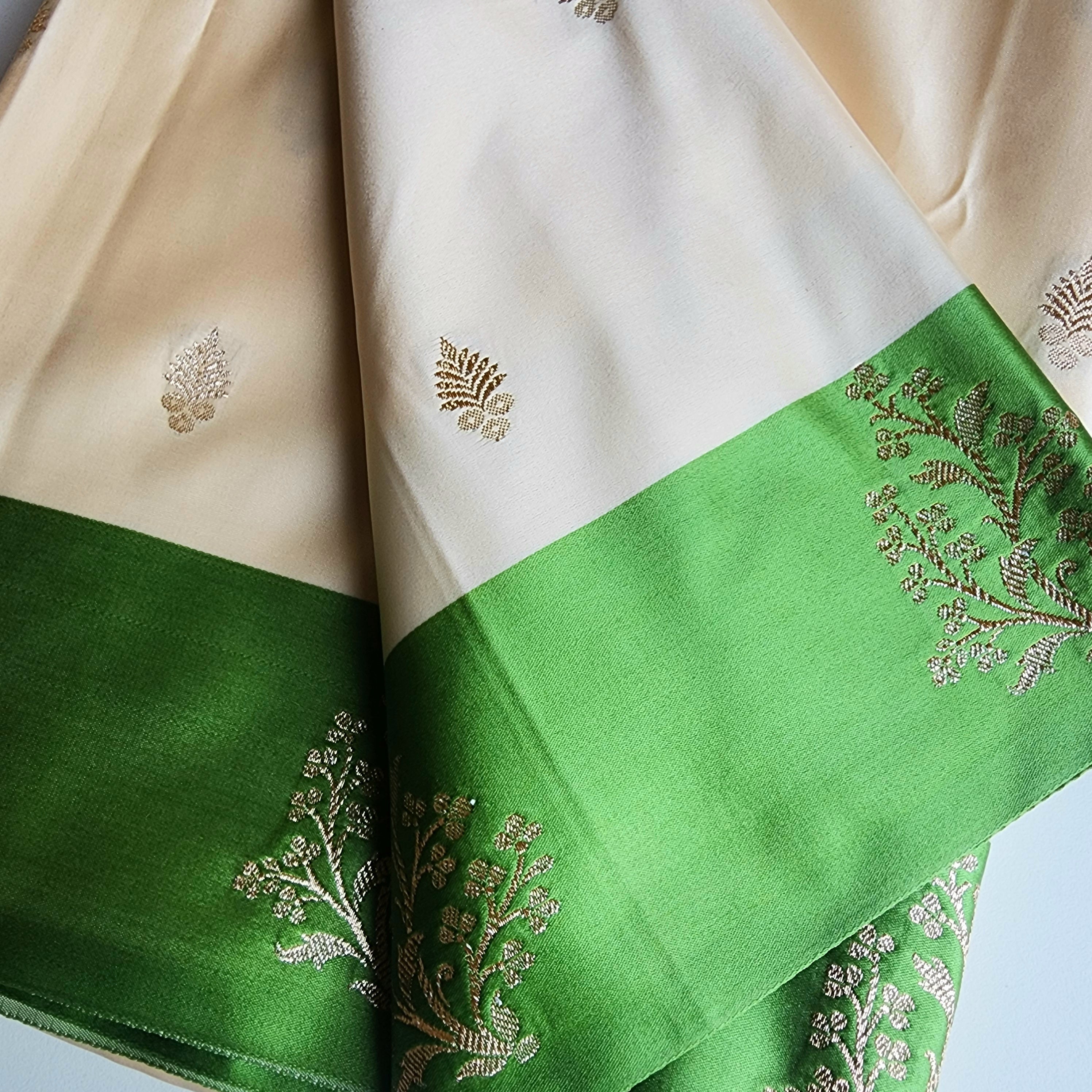 White Katan Silk Saree with Green and Gold Zari Border