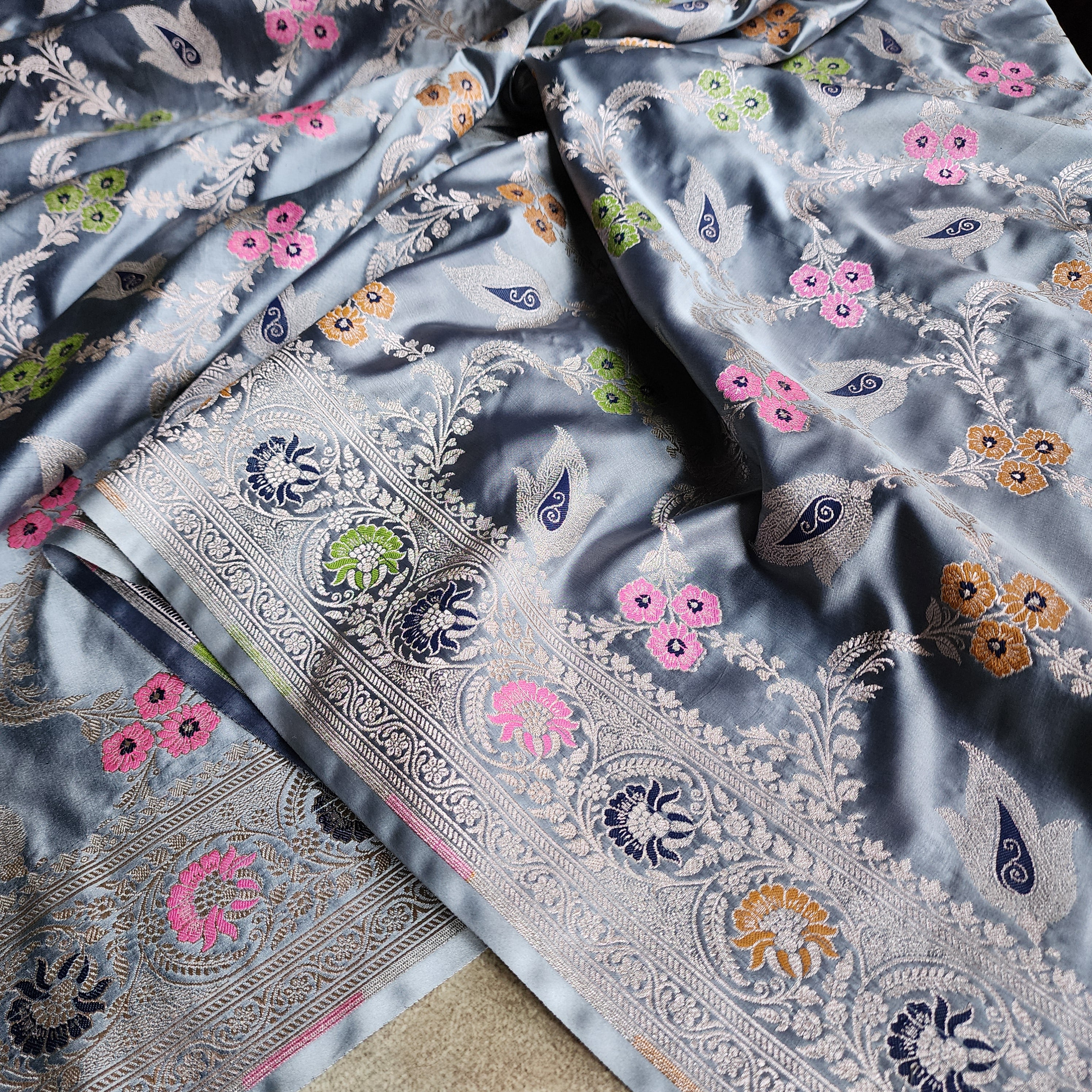 Enriched Dusky Blue Banarasi Katan Silk Saree with Multicolor Meenakari Floral Jaal