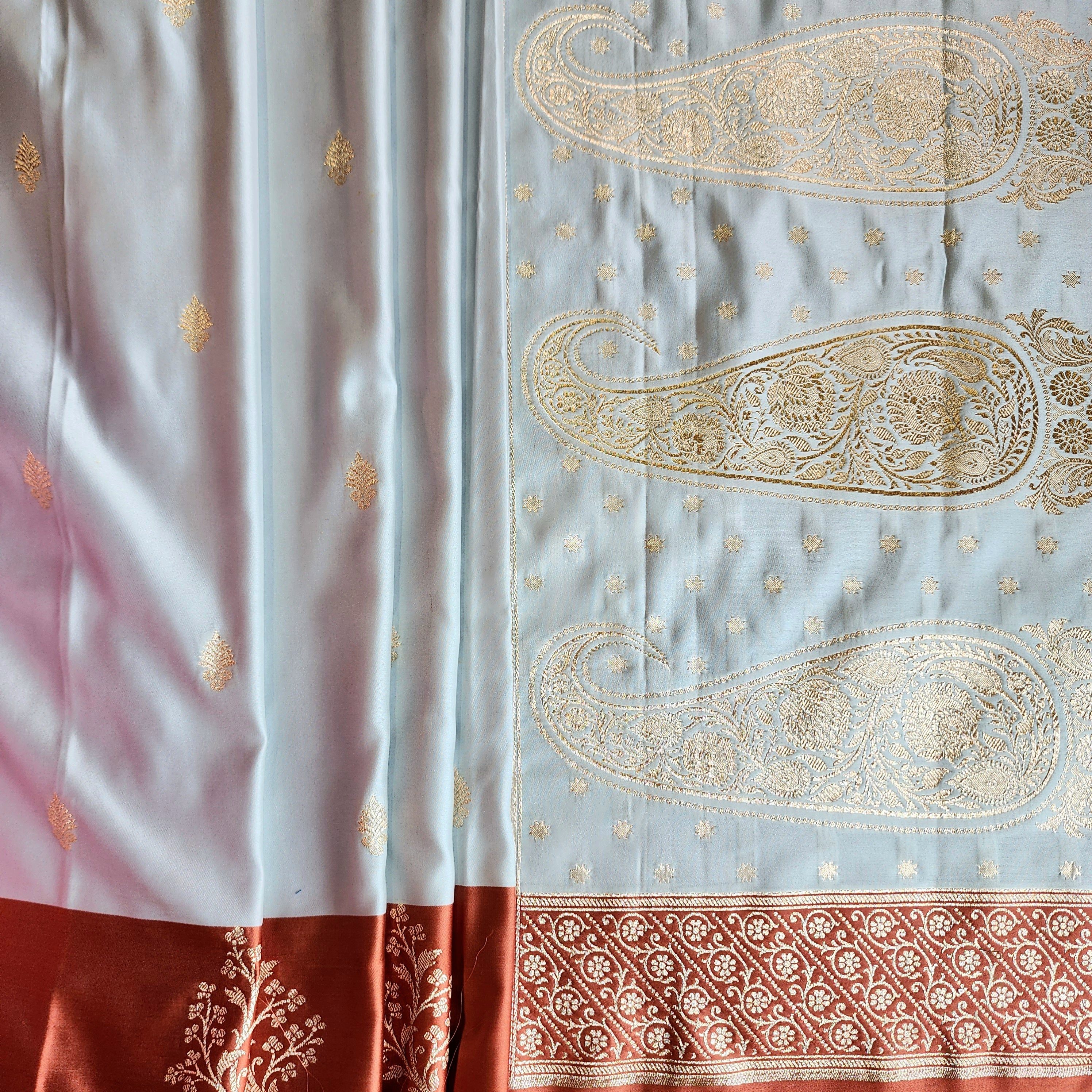 Ice Blue Katan Silk Saree with Peach Beige Gold Zari Border