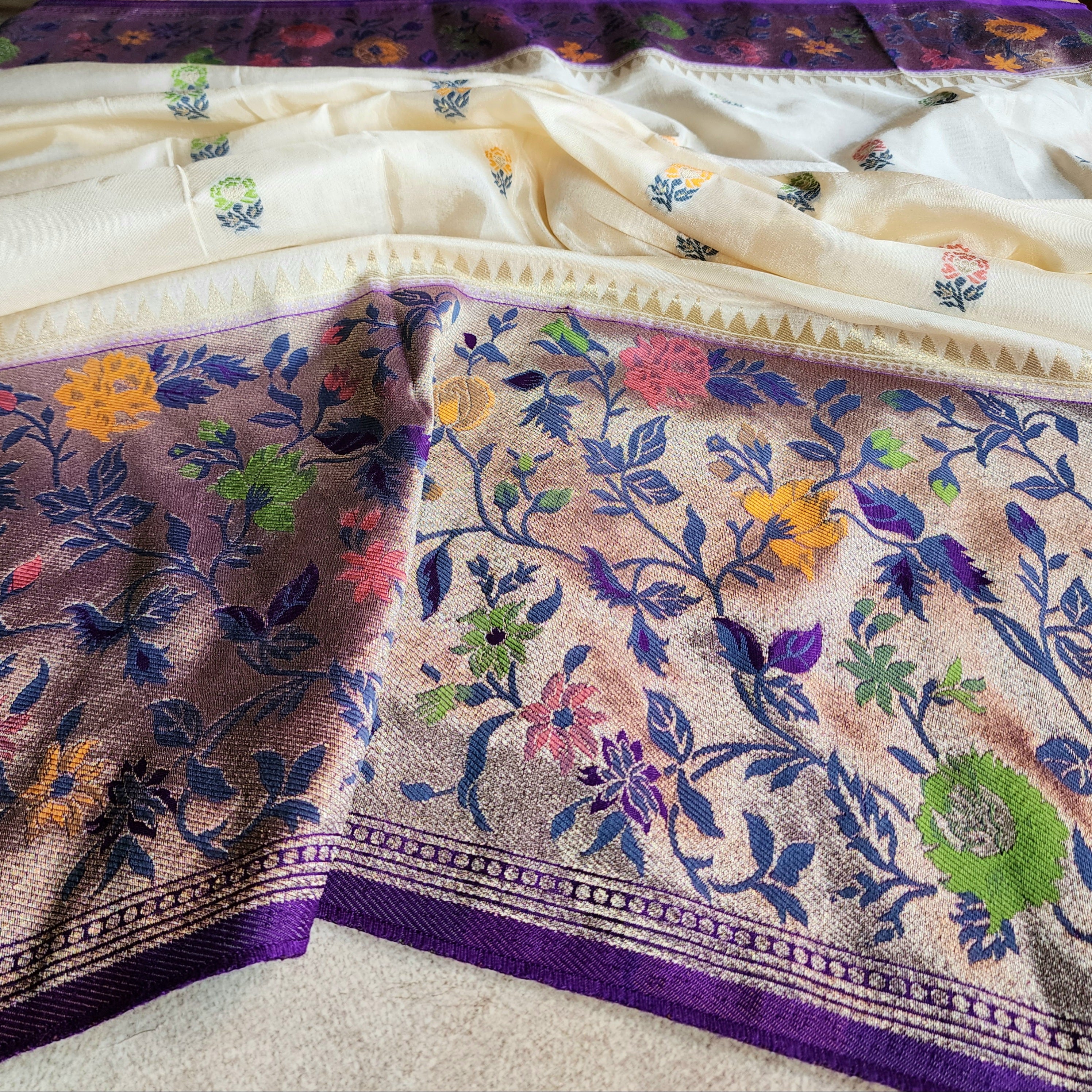 Soft Ivory Raw Silk Saree With Pastel Floral Weaving and Lilac Purple Border