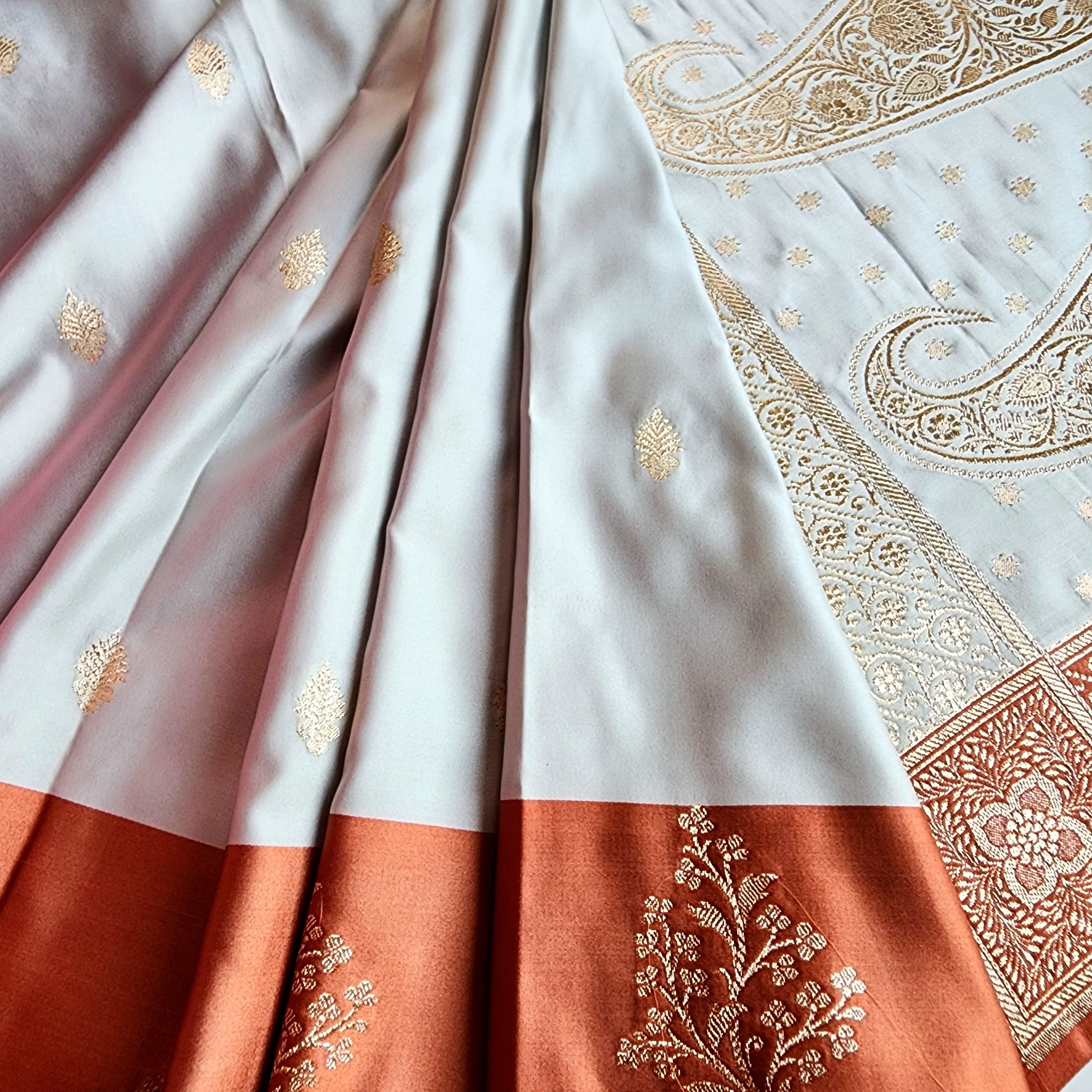Ice Blue Katan Silk Saree with Peach Beige Gold Zari Border
