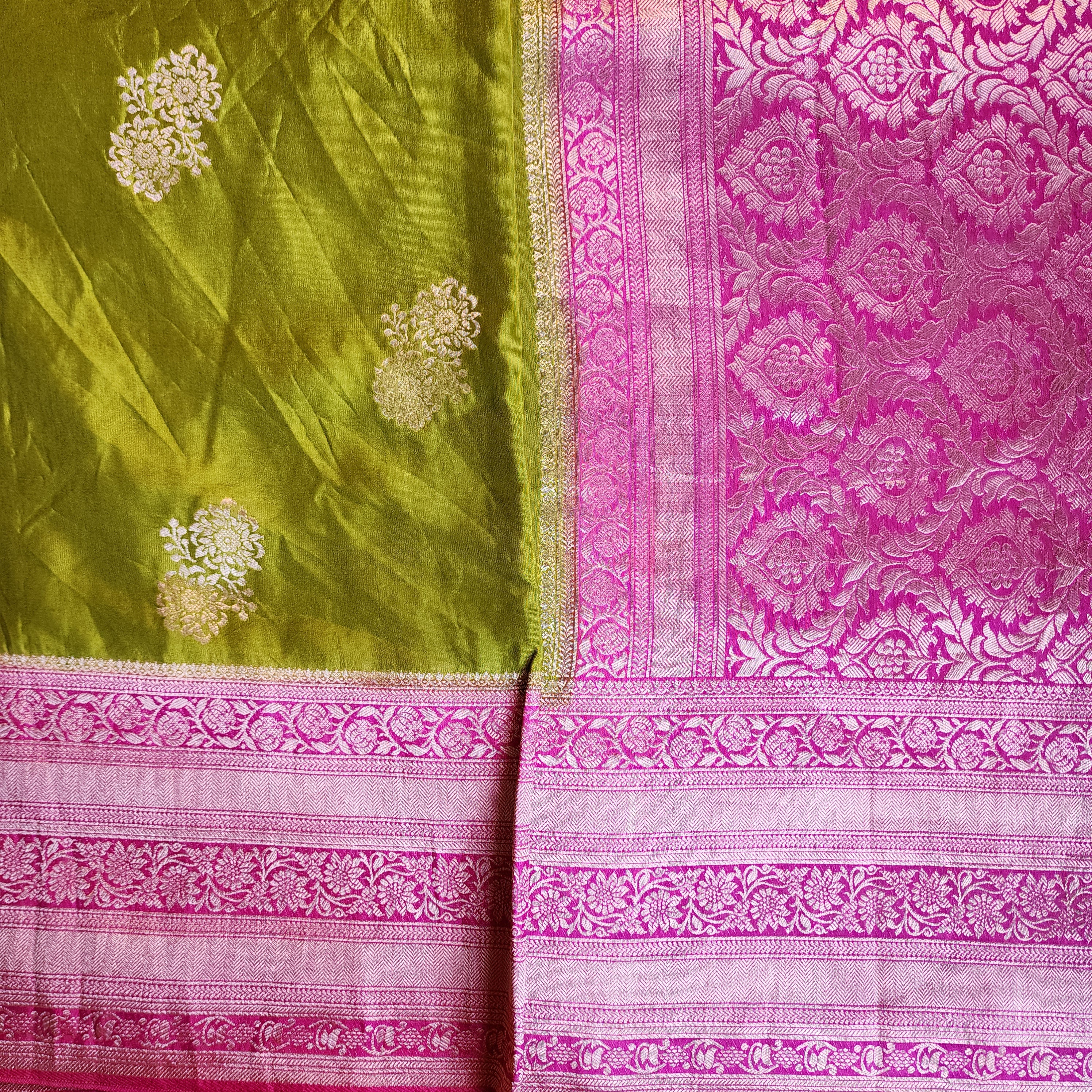 Olive Green Muslin Silk Saree with Traditional Silver Zari Work