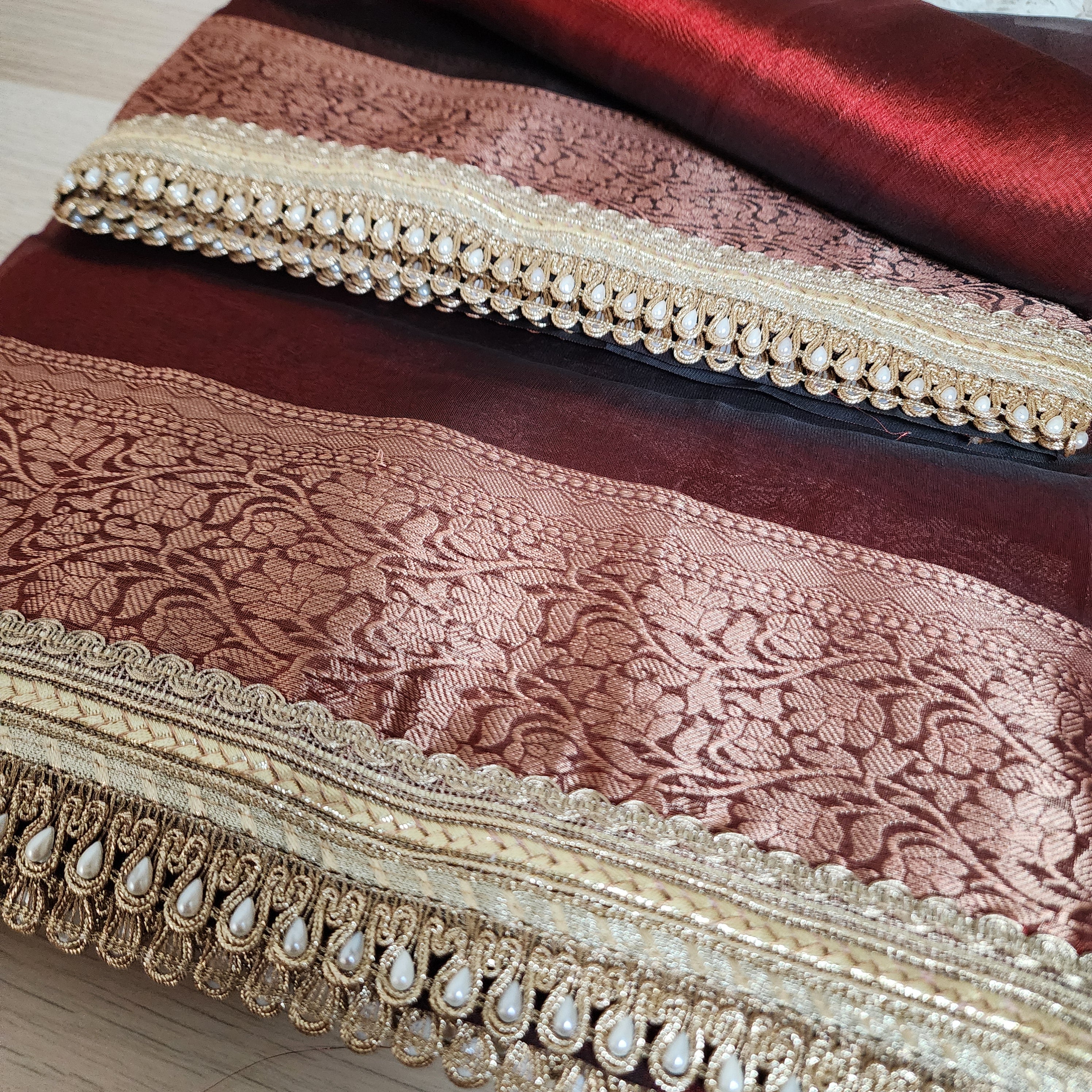 Carmine Red Tissue Silk Saree with beaded lace work