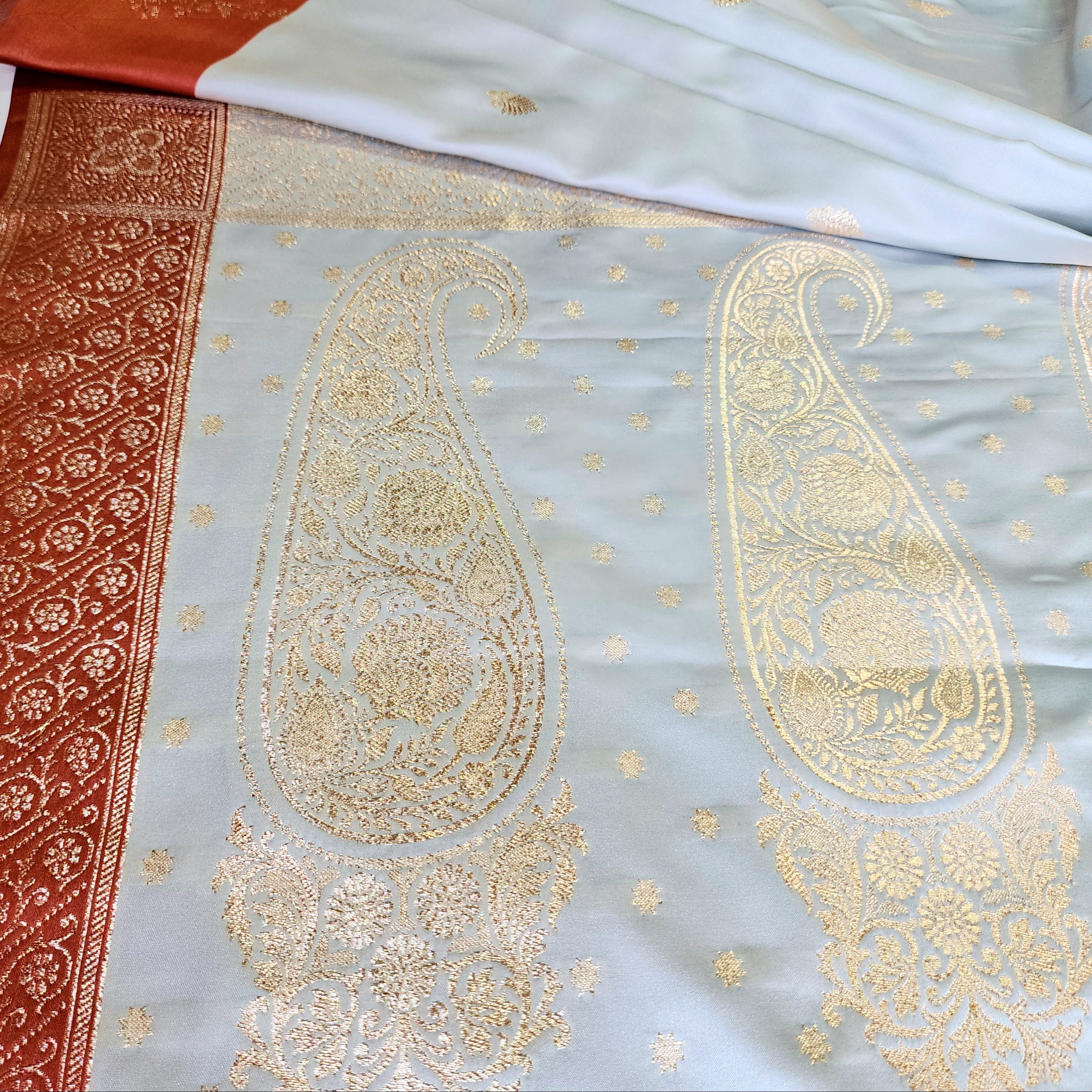 Ice Blue Katan Silk Saree with Peach Beige Gold Zari Border