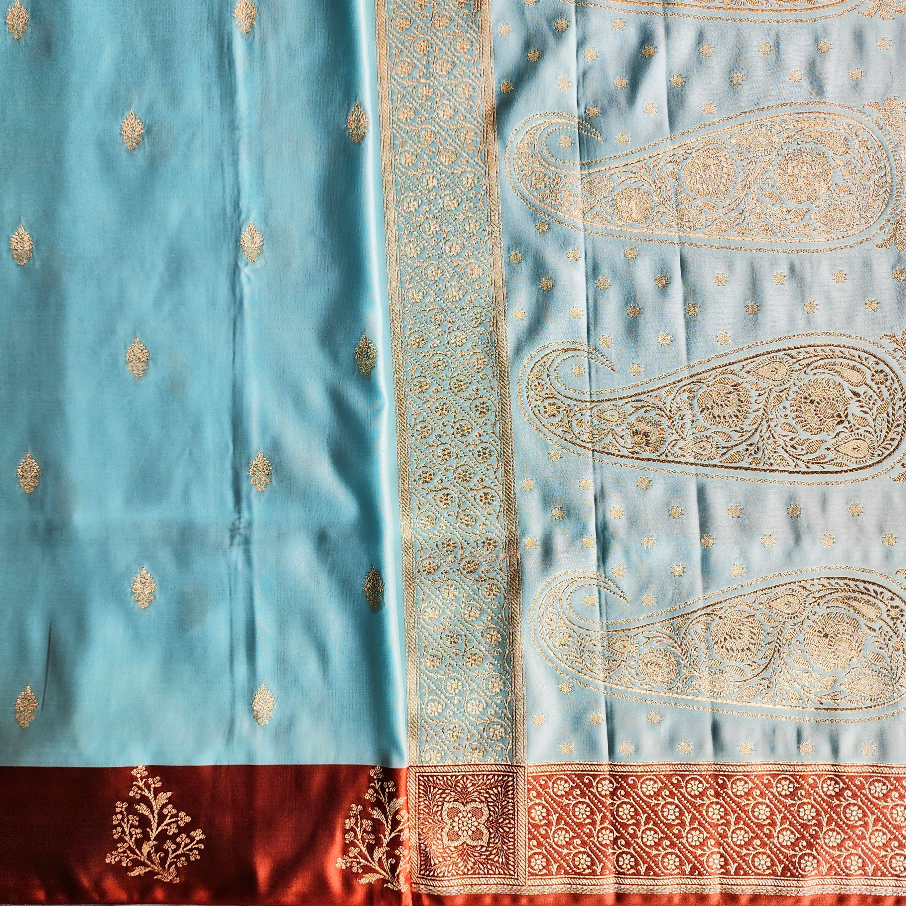 Powder Blue Katan Silk Saree with Rust Orange Gold Zari Border
