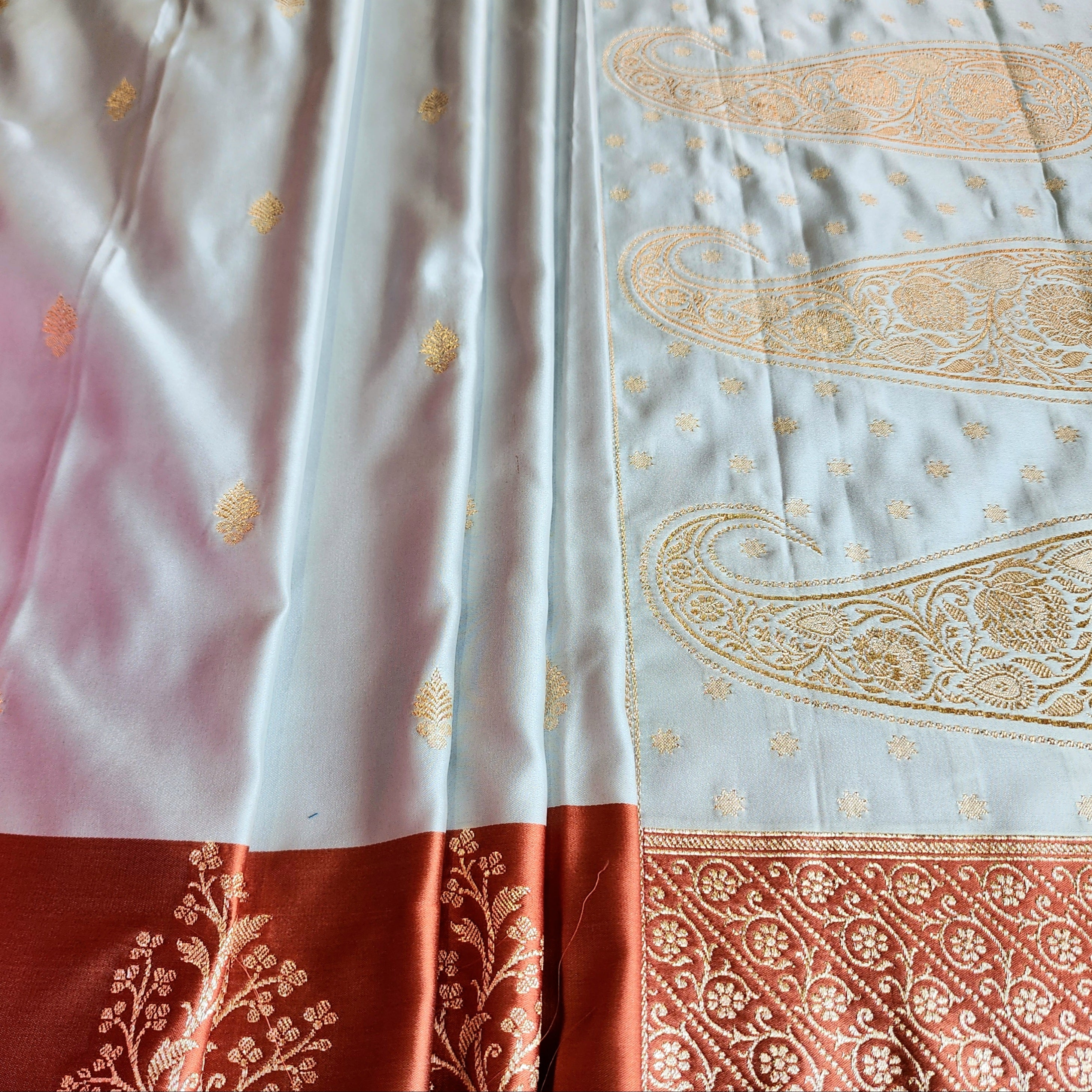 Ice Blue Katan Silk Saree with Peach Beige Gold Zari Border
