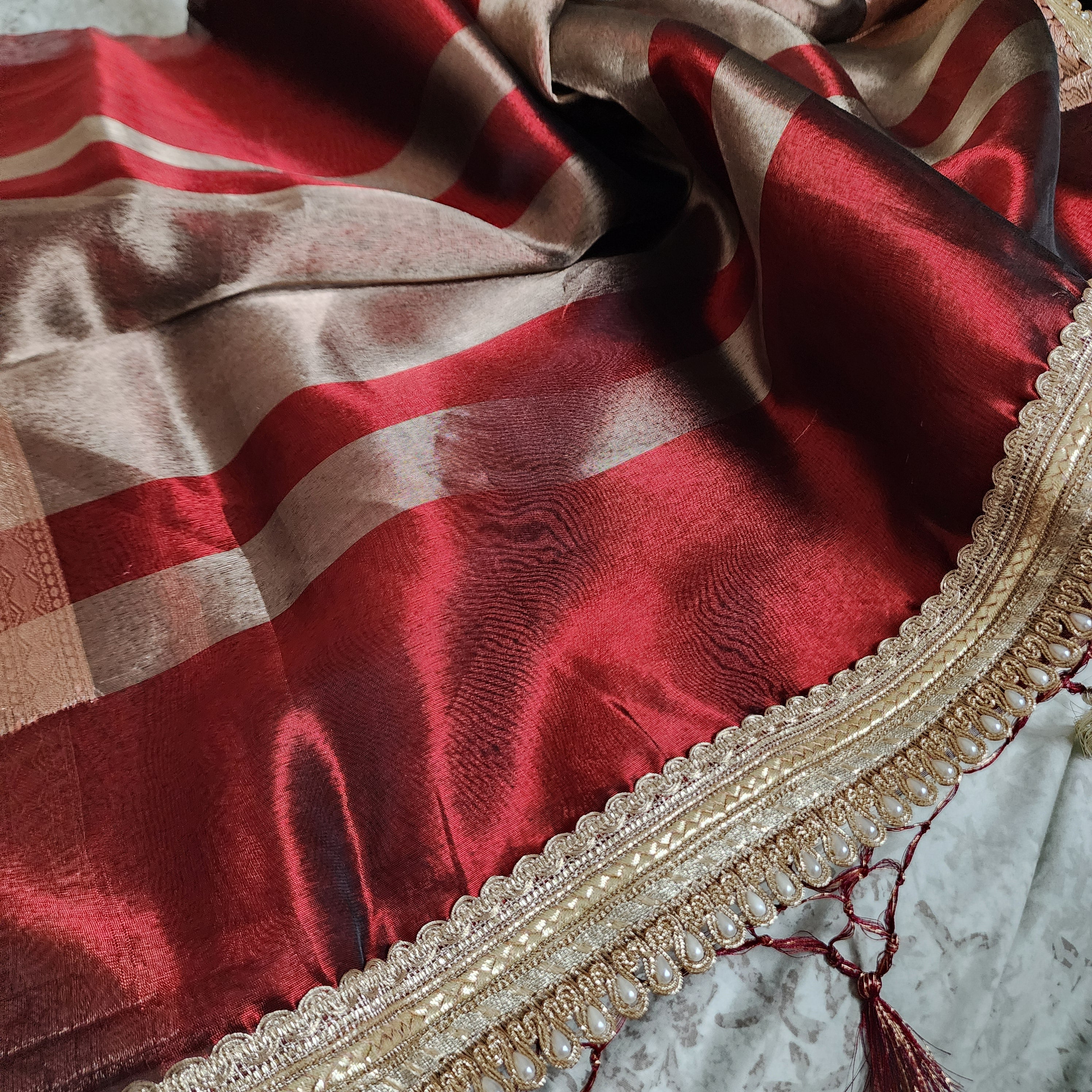 Carmine Red Tissue Silk Saree with beaded lace work