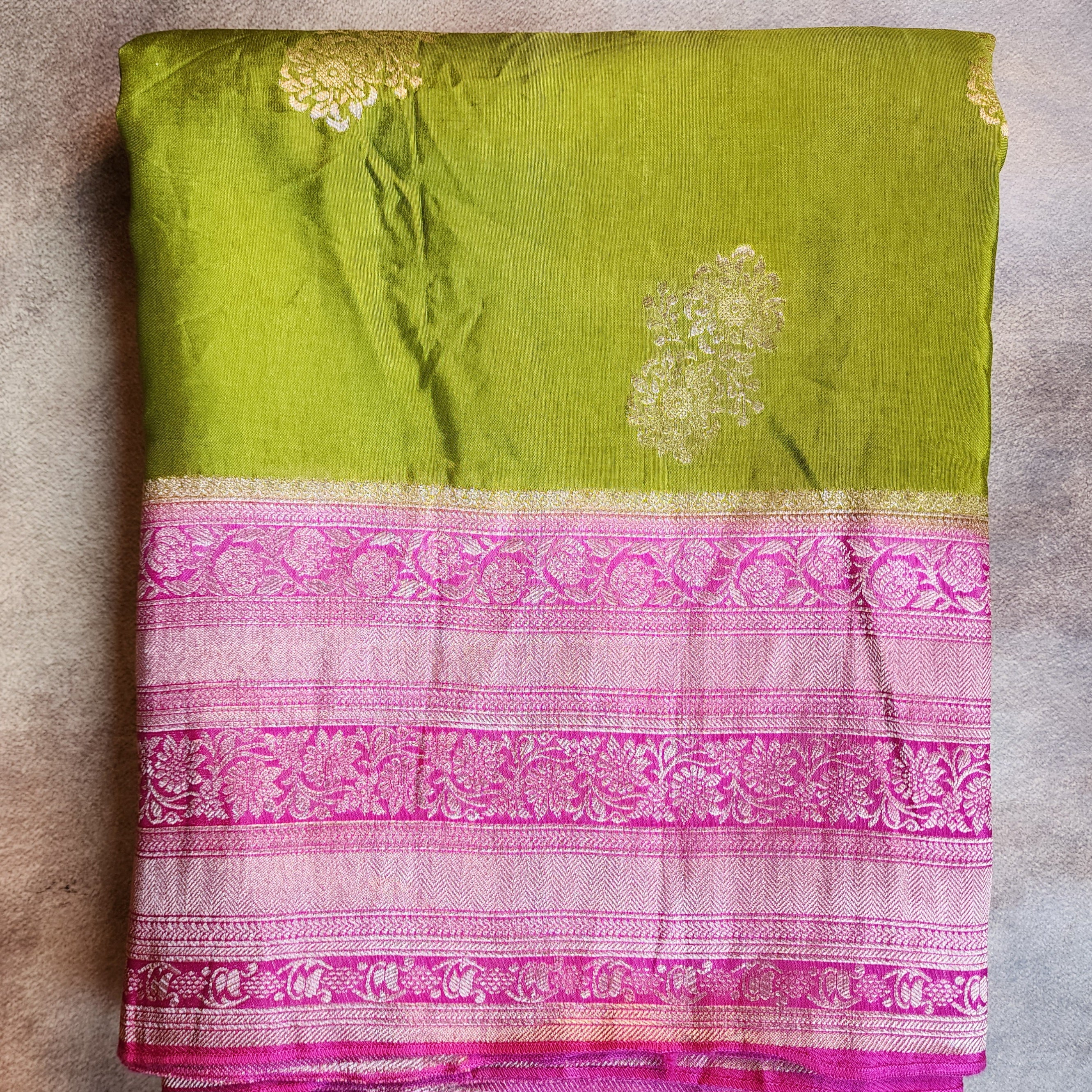 Olive Green Muslin Silk Saree with Traditional Silver Zari Work