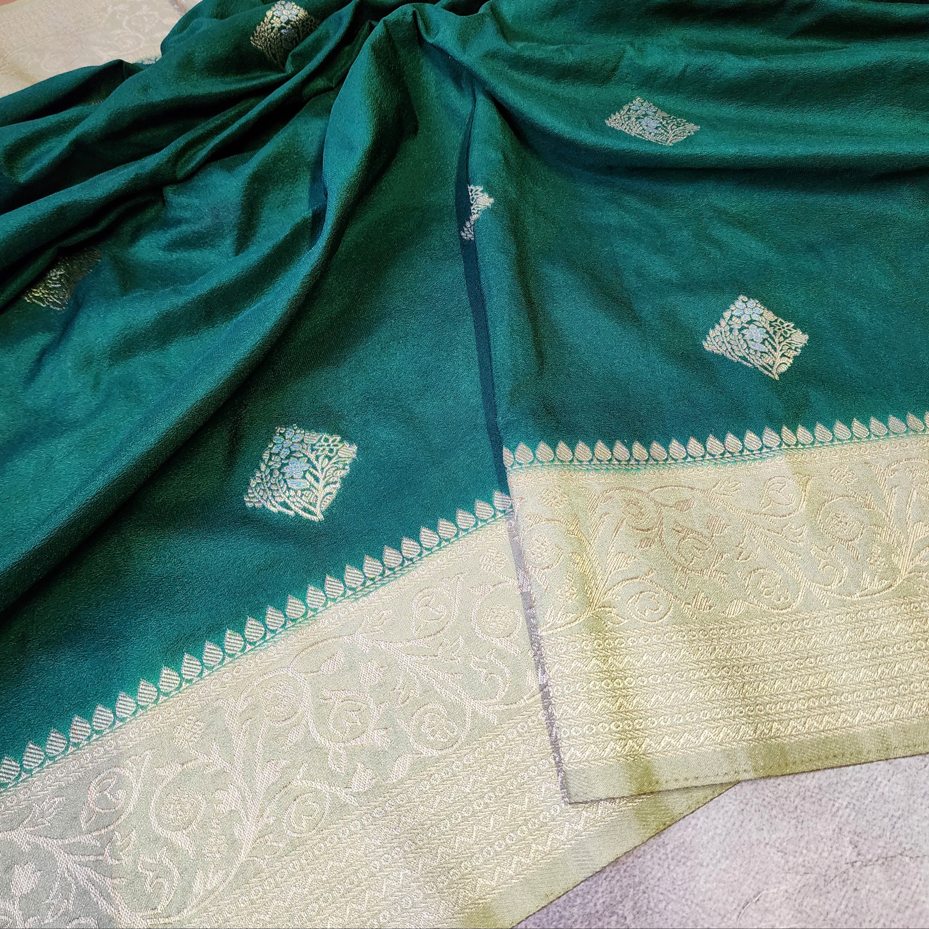 Bottle Green Crepe Georgette Silk Saree with Soft Champagne Gold Zari Border