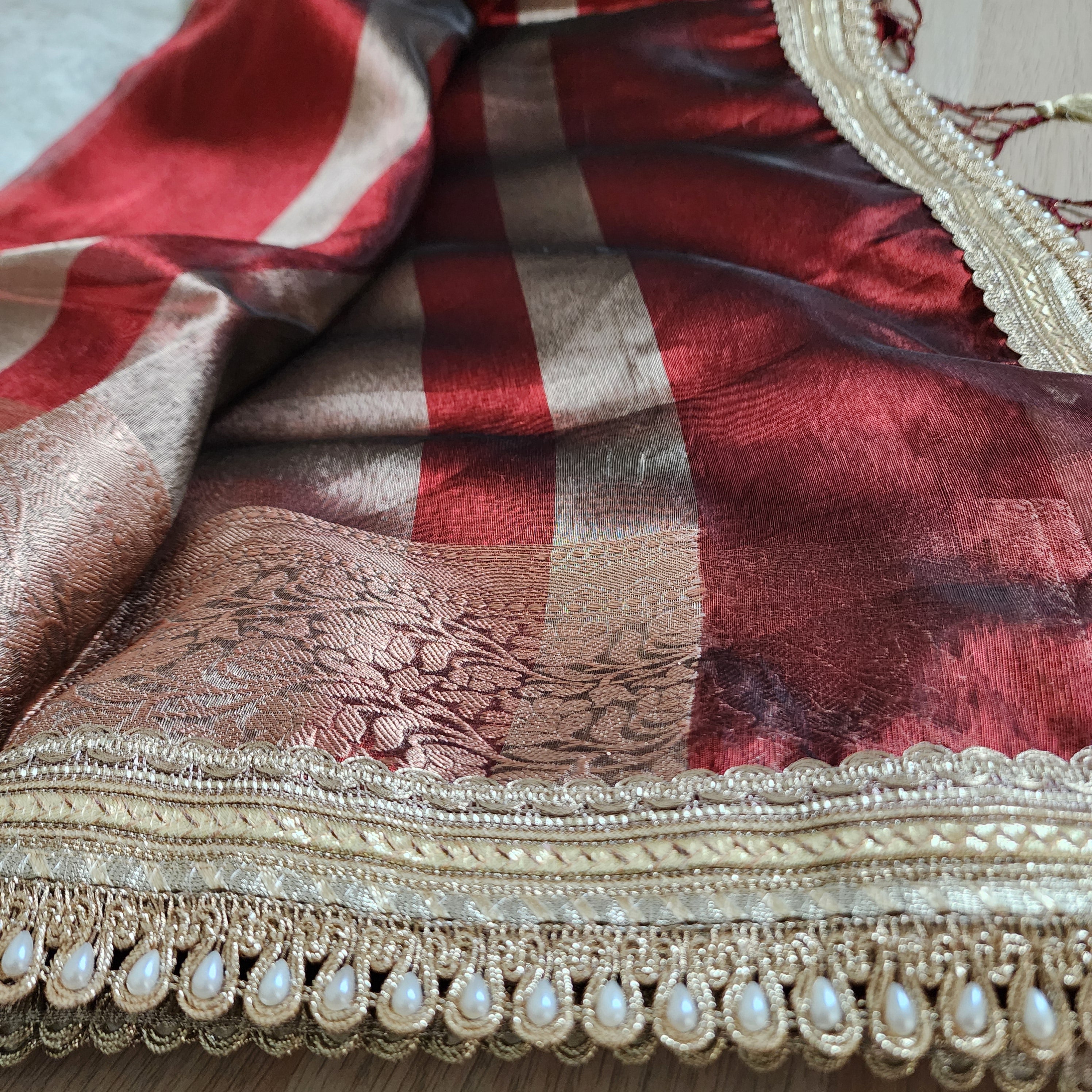 Carmine Red Tissue Silk Saree with beaded lace work