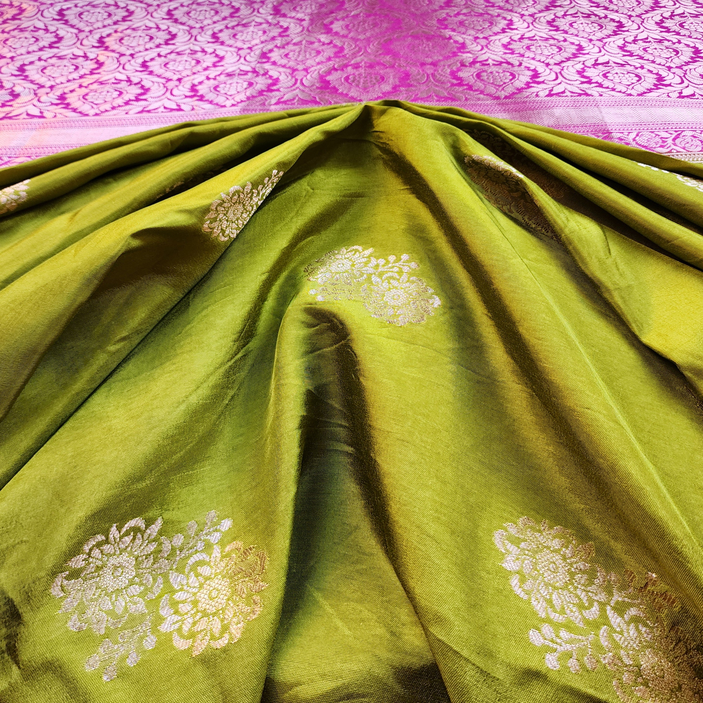 Olive Green Muslin Silk Saree with Traditional Silver Zari Work