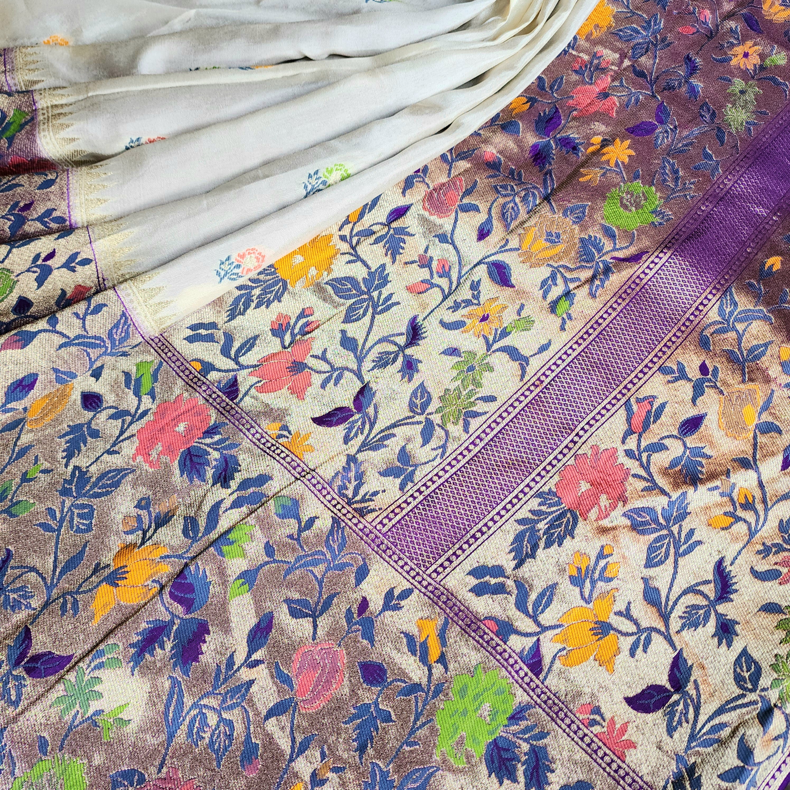 Soft Ivory Raw Silk Saree With Pastel Floral Weaving and Lilac Purple Border