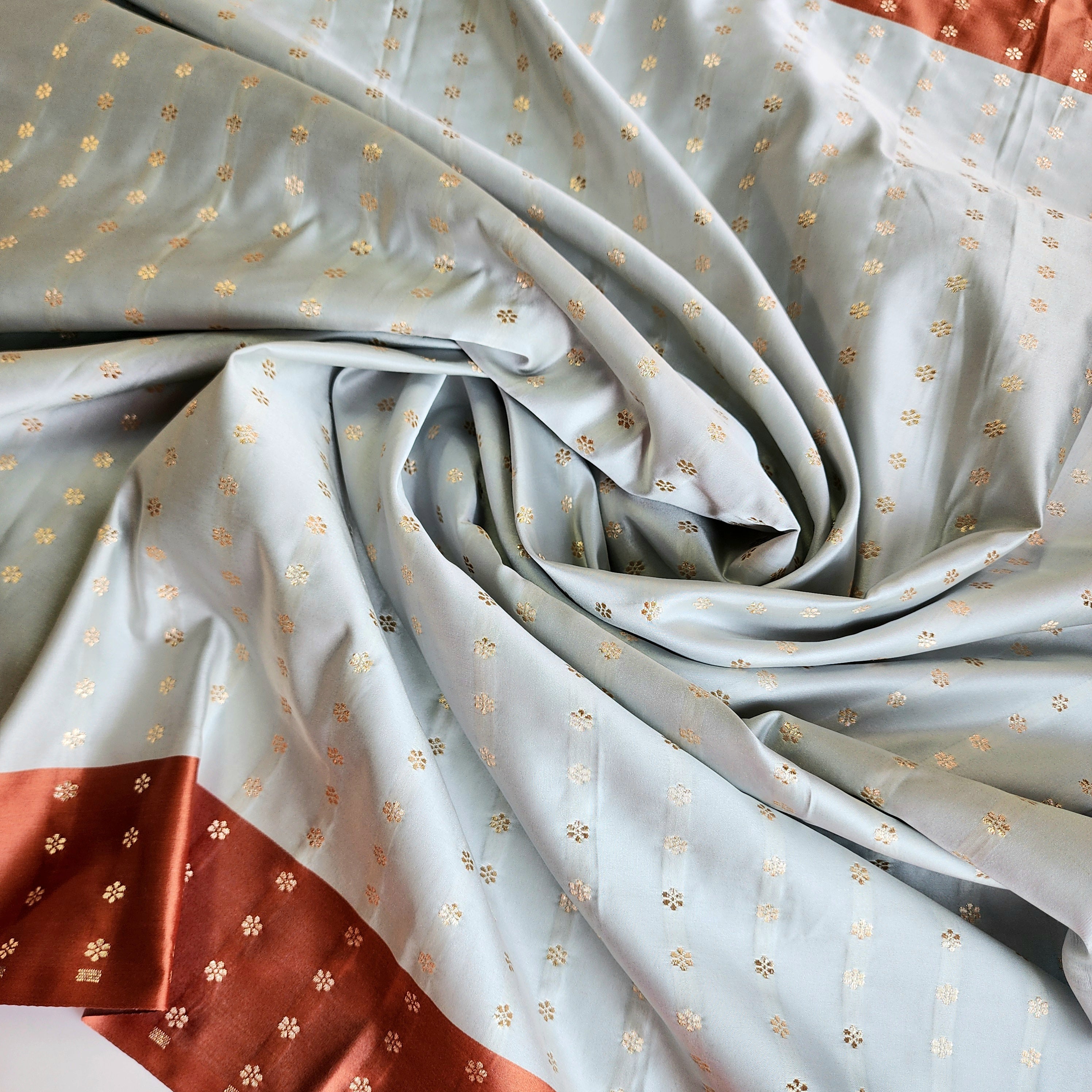 Ice Blue Katan Silk Saree with Peach Beige Gold Zari Border