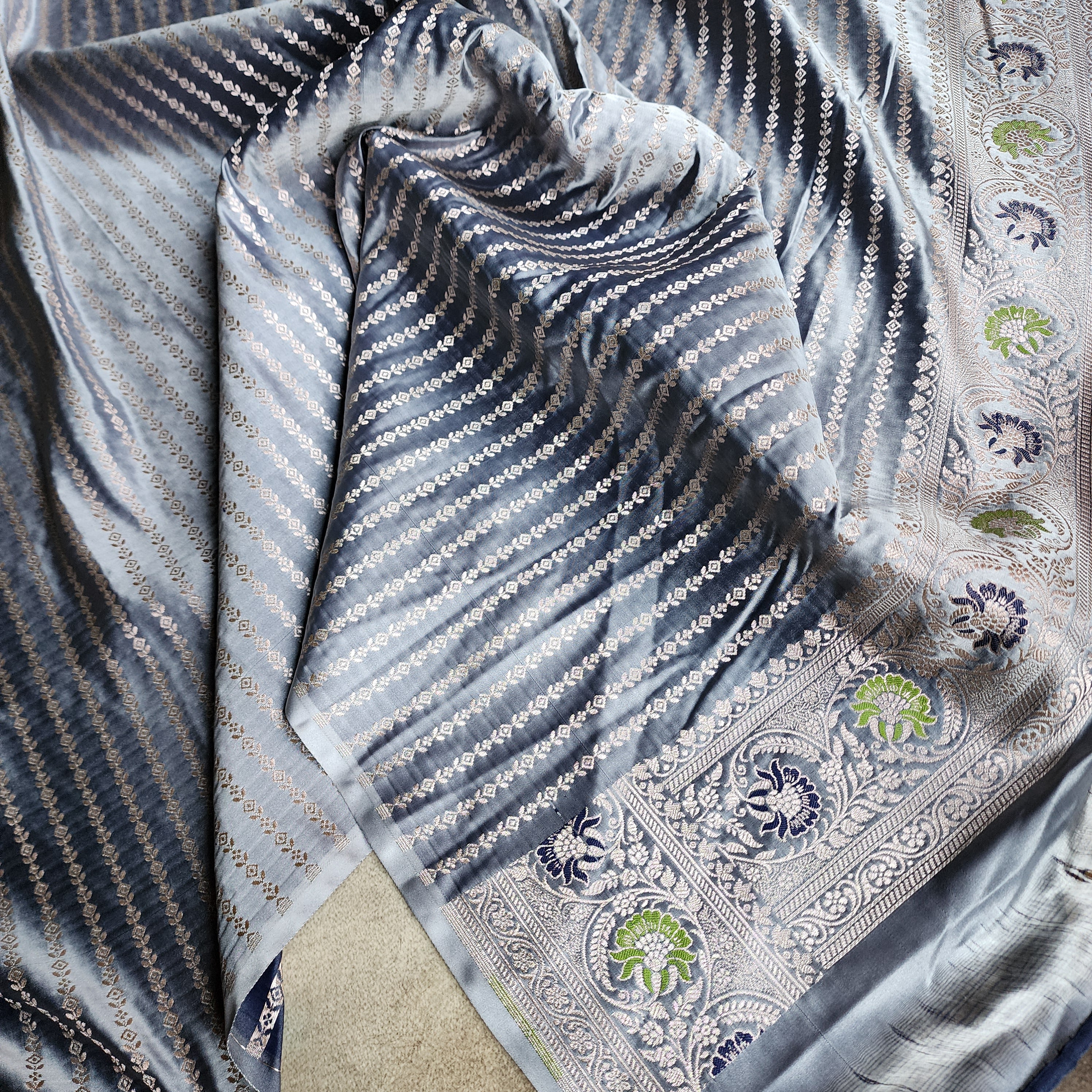 Enriched Dusky Blue Banarasi Katan Silk Saree with Multicolor Meenakari Floral Jaal