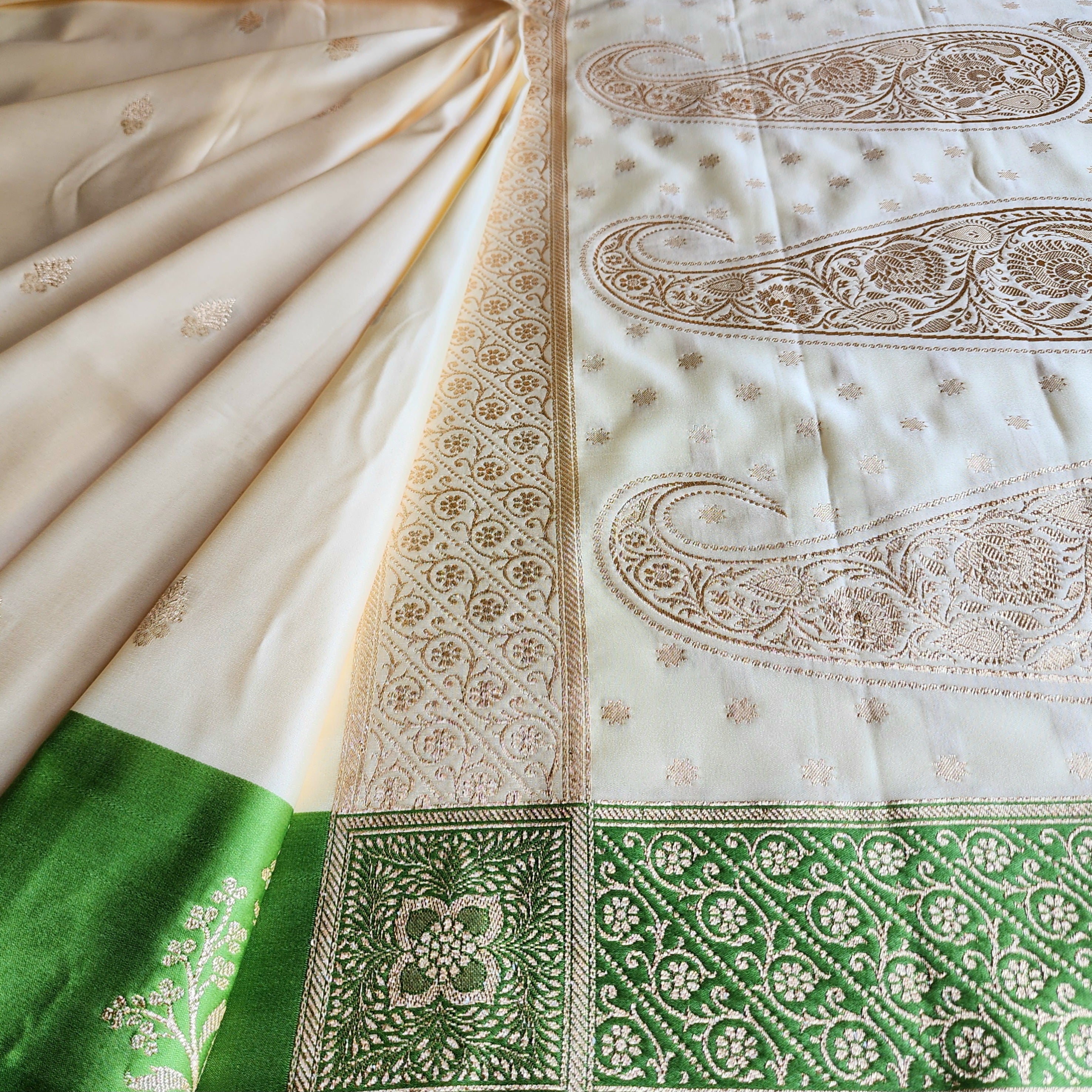 White Katan Silk Saree with Green and Gold Zari Border