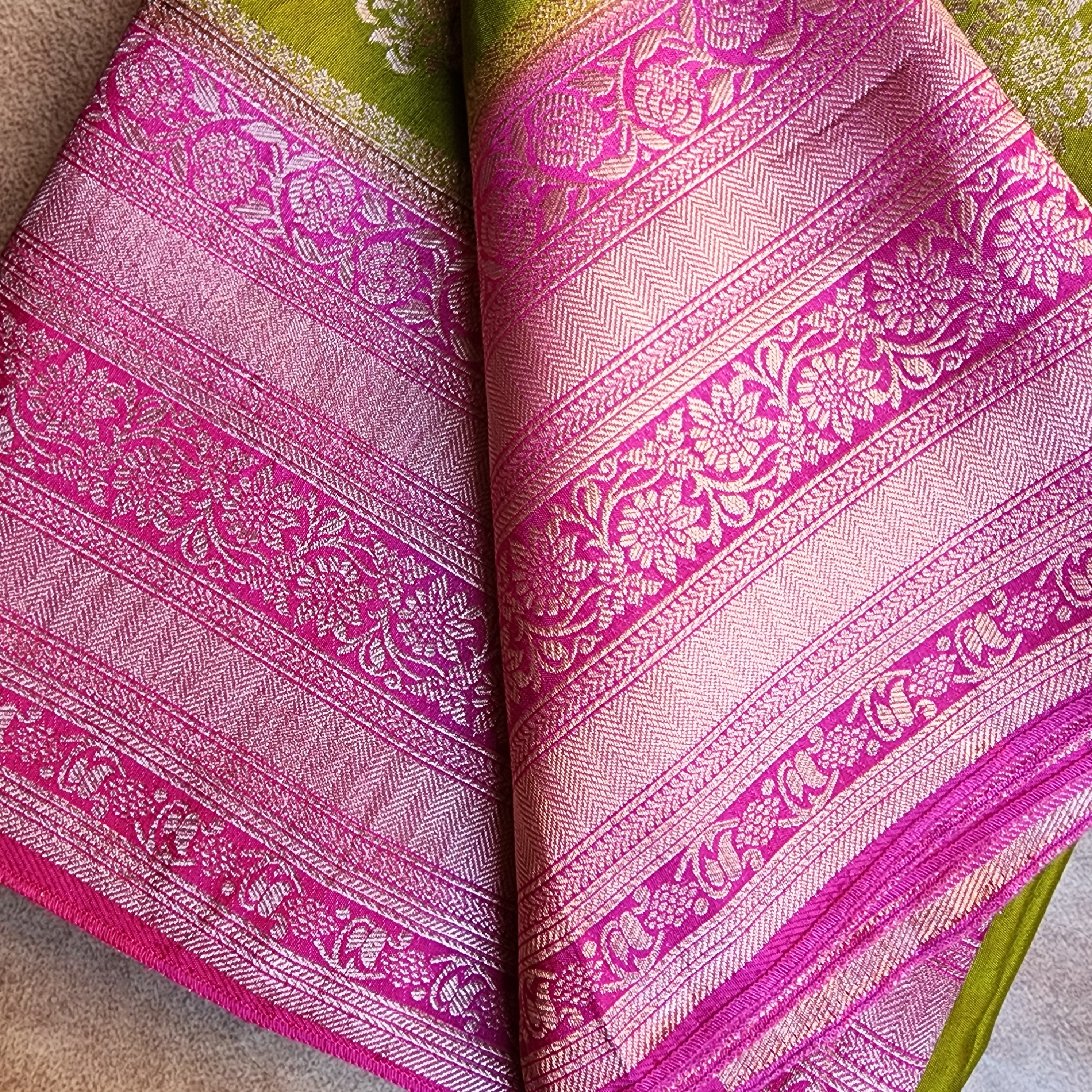 Olive Green Muslin Silk Saree with Traditional Silver Zari Work