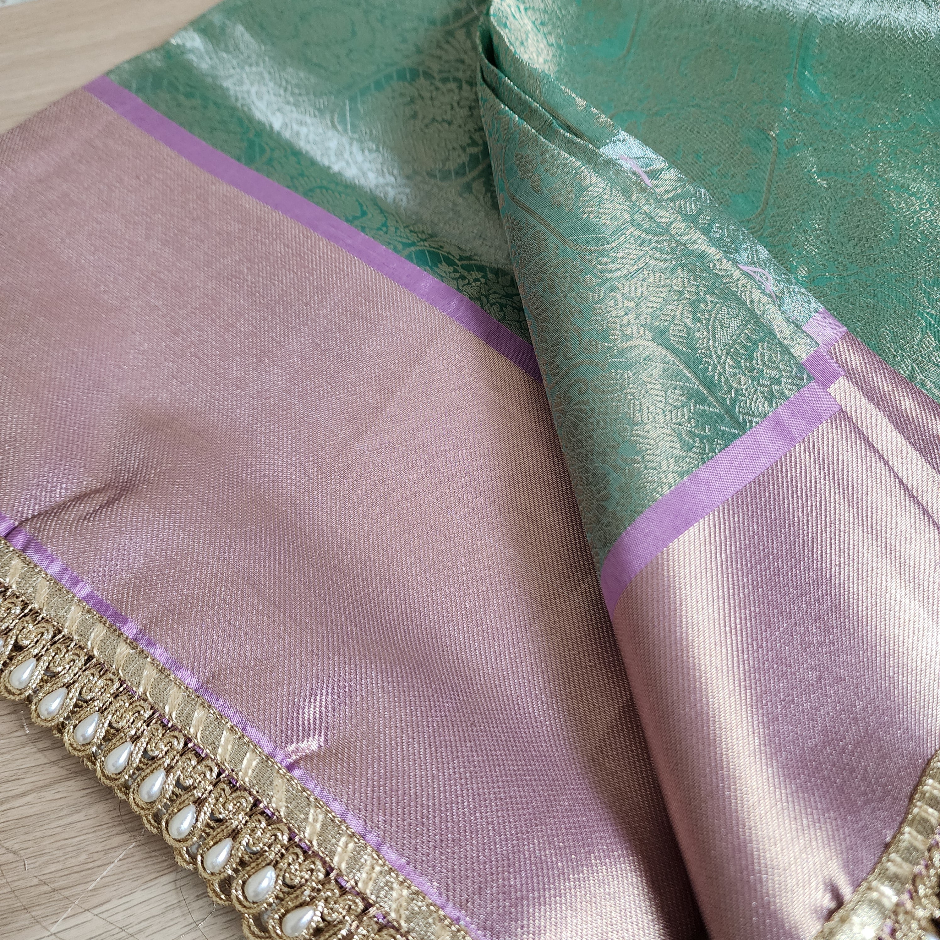 Pastel Sea Green and Pink Brocade Tissue Saree with beaded lace work