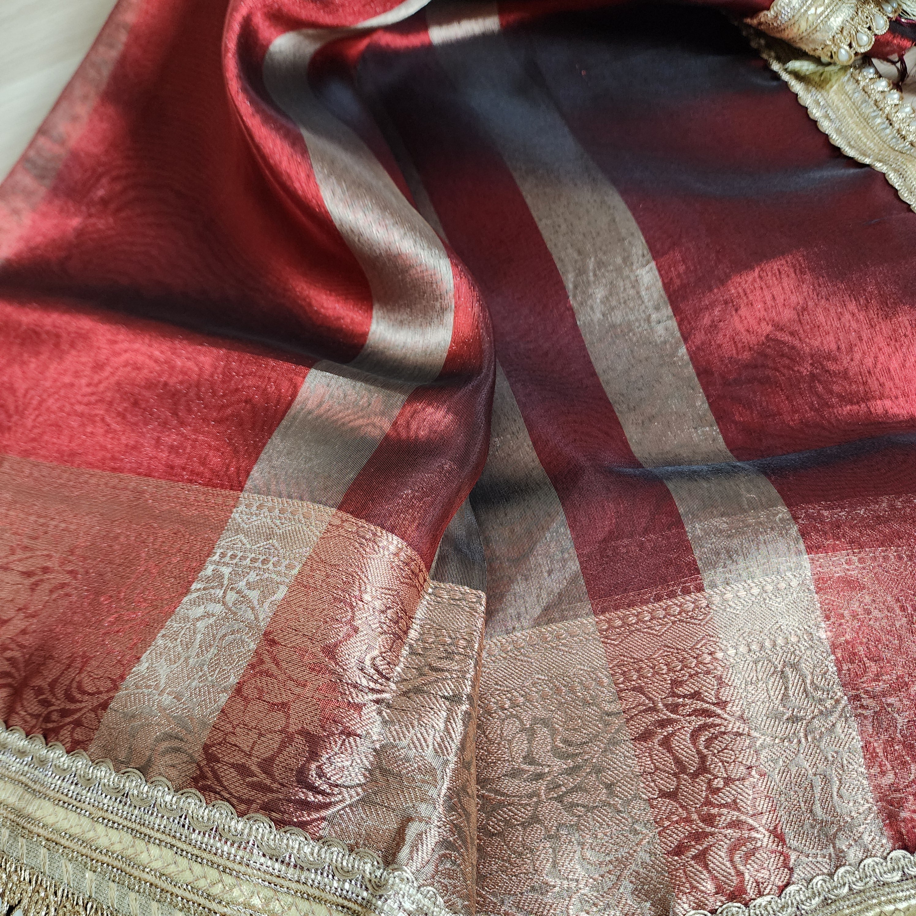 Carmine Red Tissue Silk Saree with beaded lace work