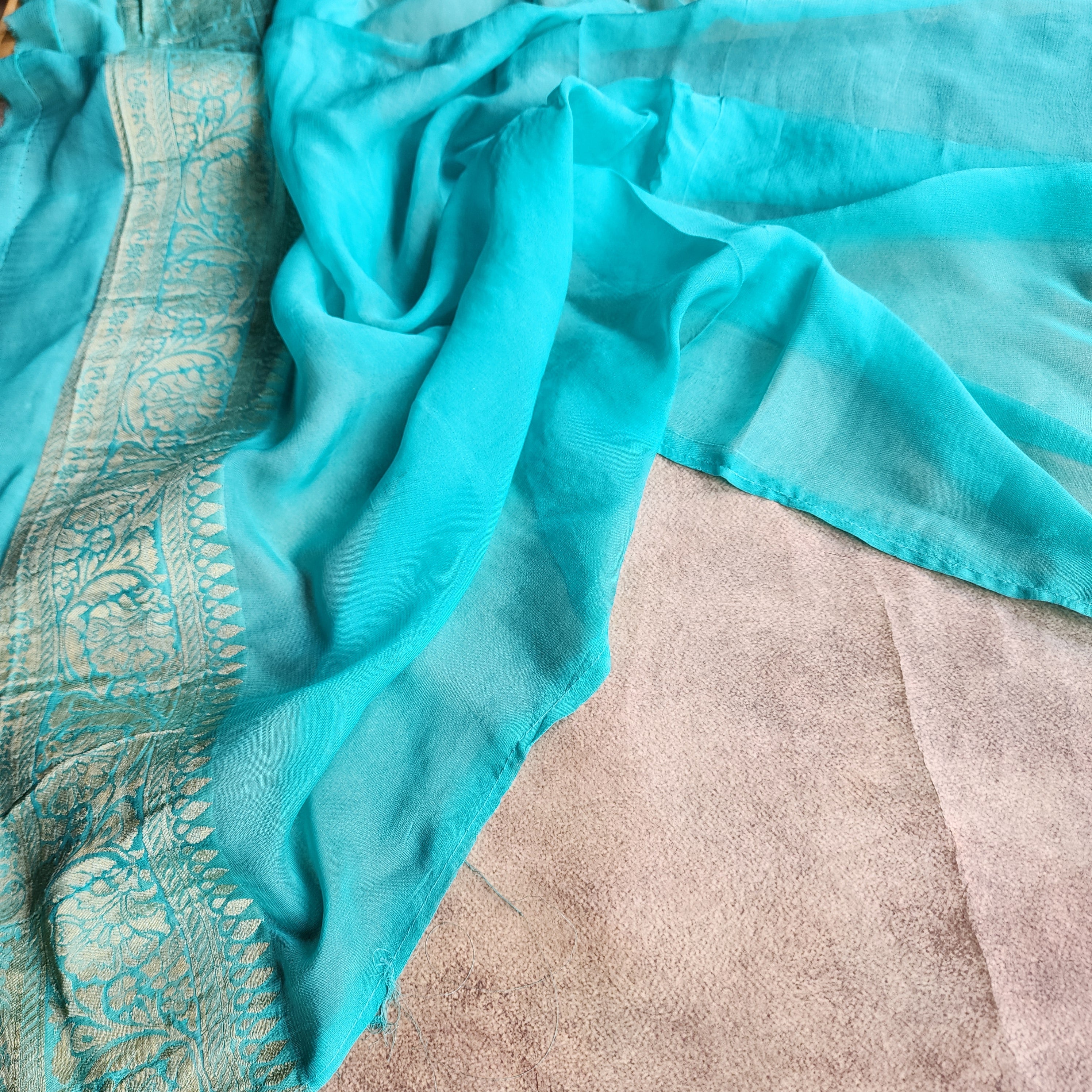 Turquoise Pure Khaddi Georgette Banarasi Saree with Golden Zari